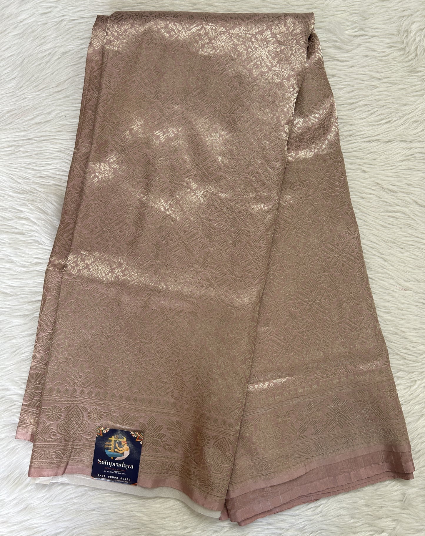 Banarasi Katan Silk Saree Light Onion Pink colored Saree complemented with a Zari border. - Sampradaya Designer Studio