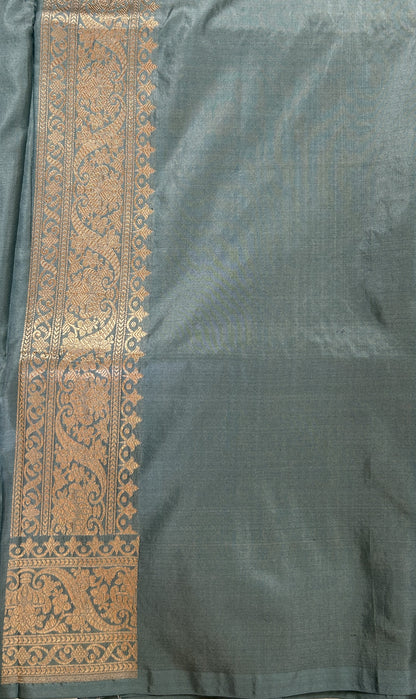 Banarasi Katan Silk Saree Light Teal Blue colored Saree complemented with a Gold Zari border. - Sampradaya Designer Studio