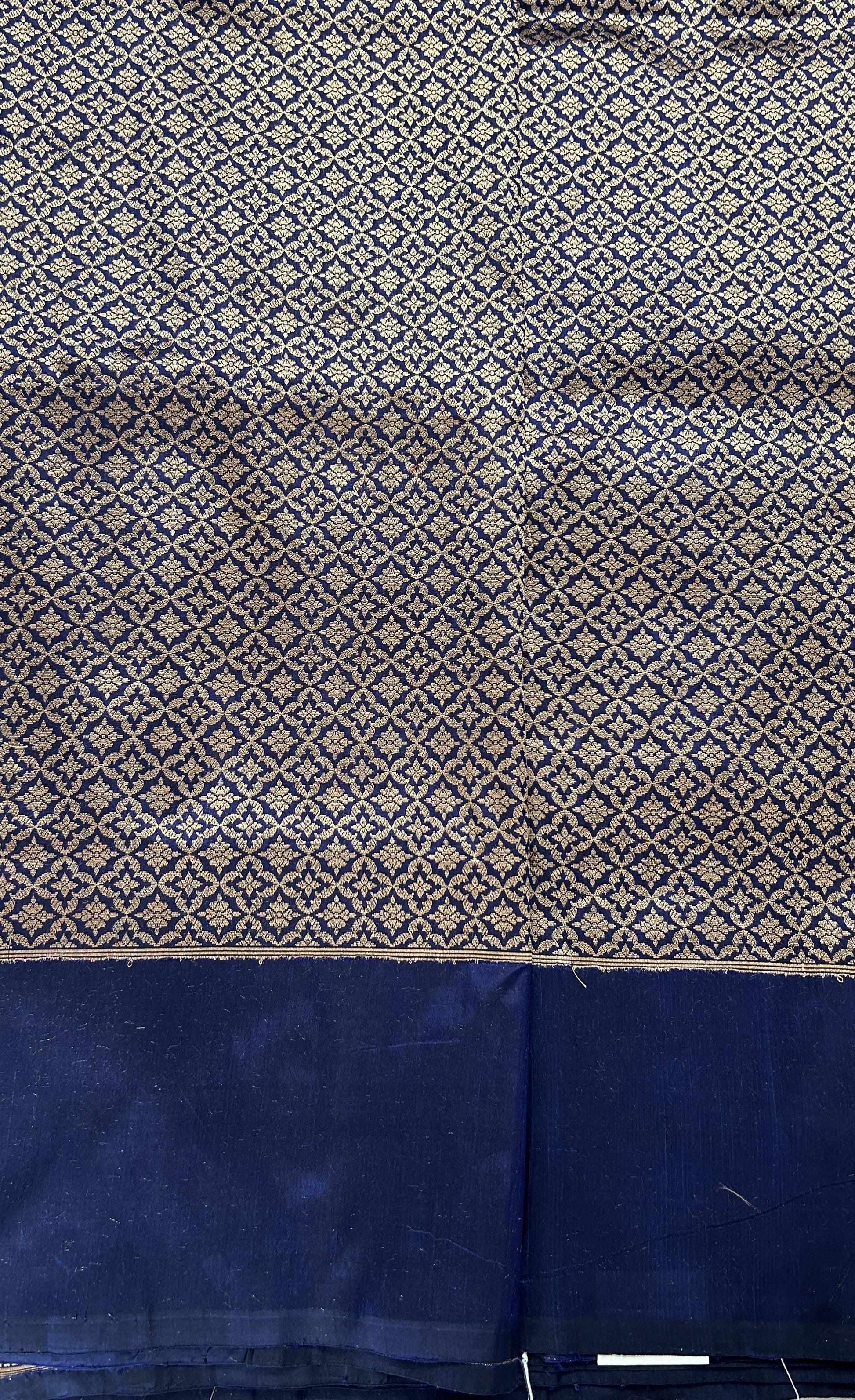 Banarasi Katan Silk Saree Navy Blue colored Saree complemented with a Gold Zari border. - Sampradaya Designer Studio