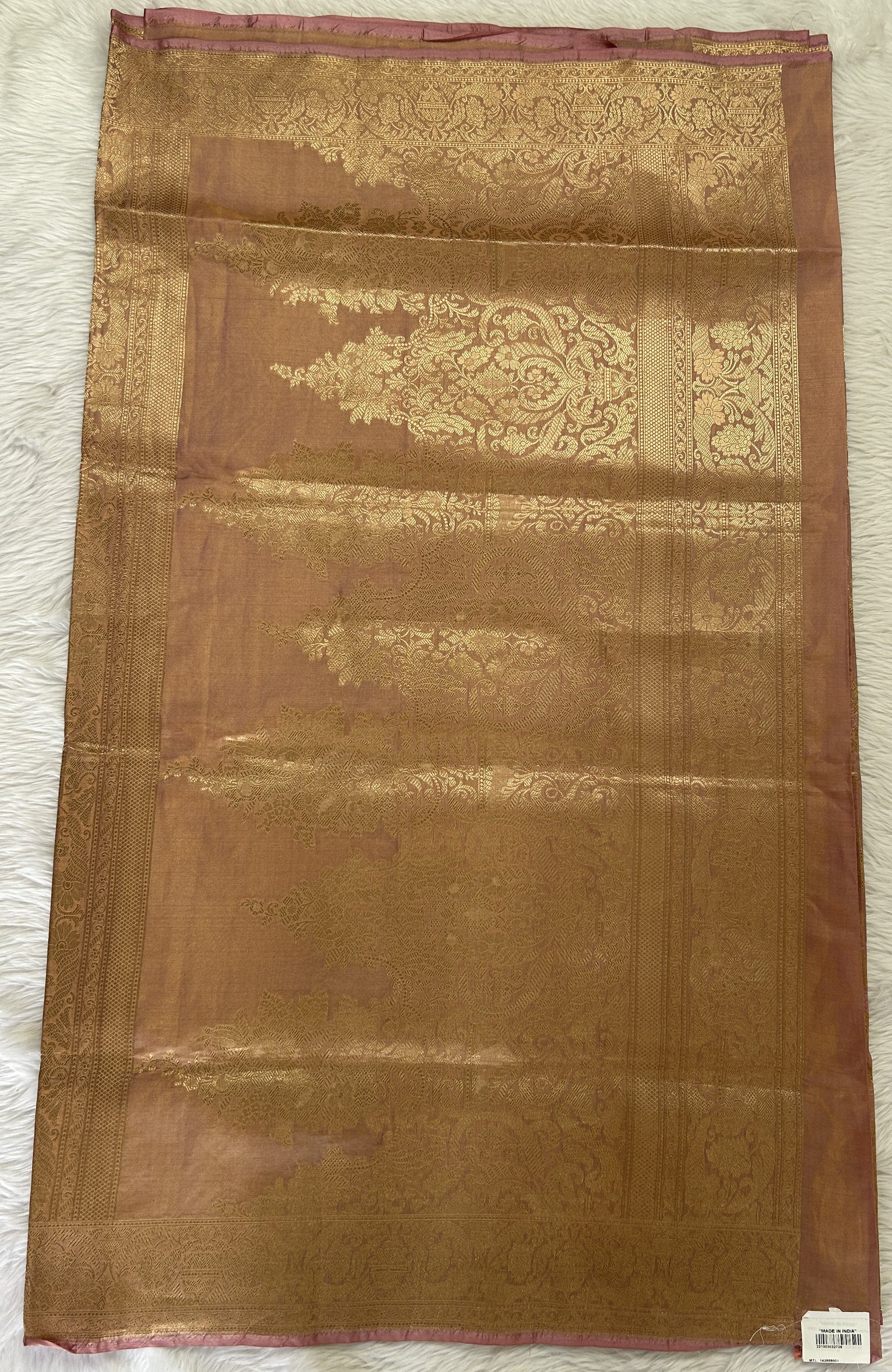 Banarasi Katan Silk Saree Light Peach colored Saree complemented with a Gold Zari border. - Sampradaya Designer Studio