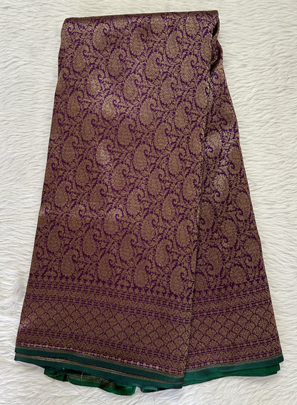 Banarasi Katan Silk Saree Dark Purple colored Saree complemented with a Gold Zari border. - Sampradaya Designer Studio