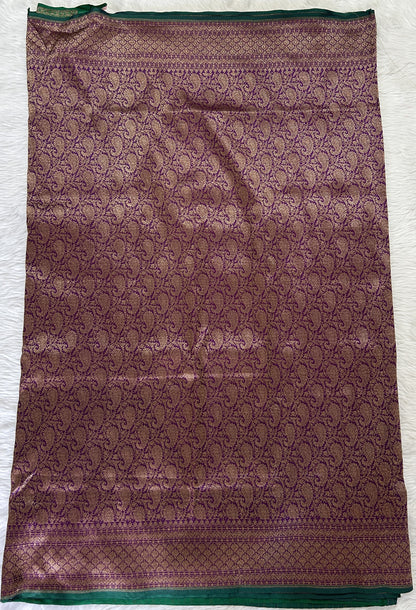 Banarasi Katan Silk Saree Dark Purple colored Saree complemented with a Gold Zari border. - Sampradaya Designer Studio