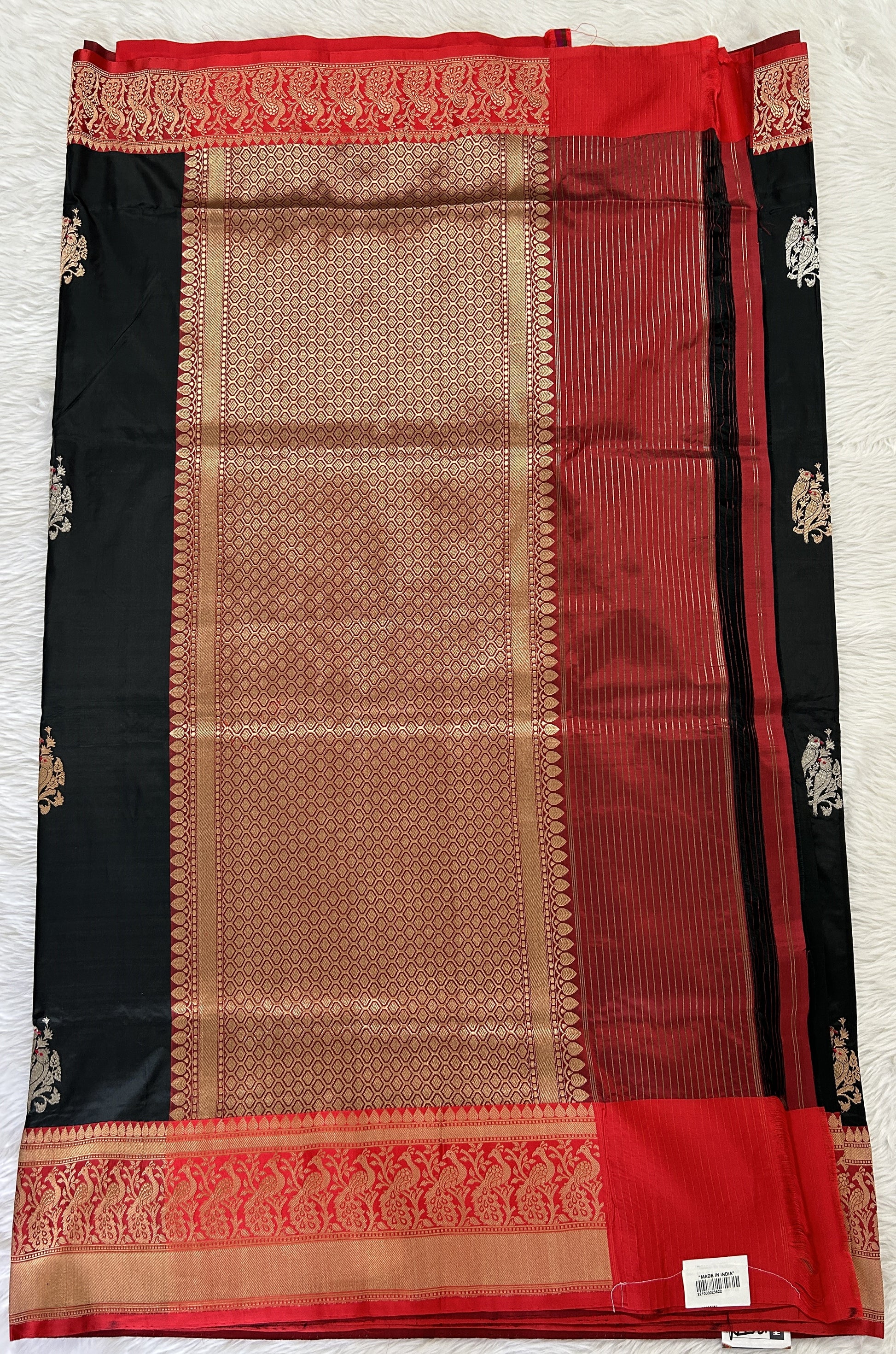 Banarasi Katan Silk Saree Black colored Saree complemented with a Red Colored Zari border. - Sampradaya Designer Studio