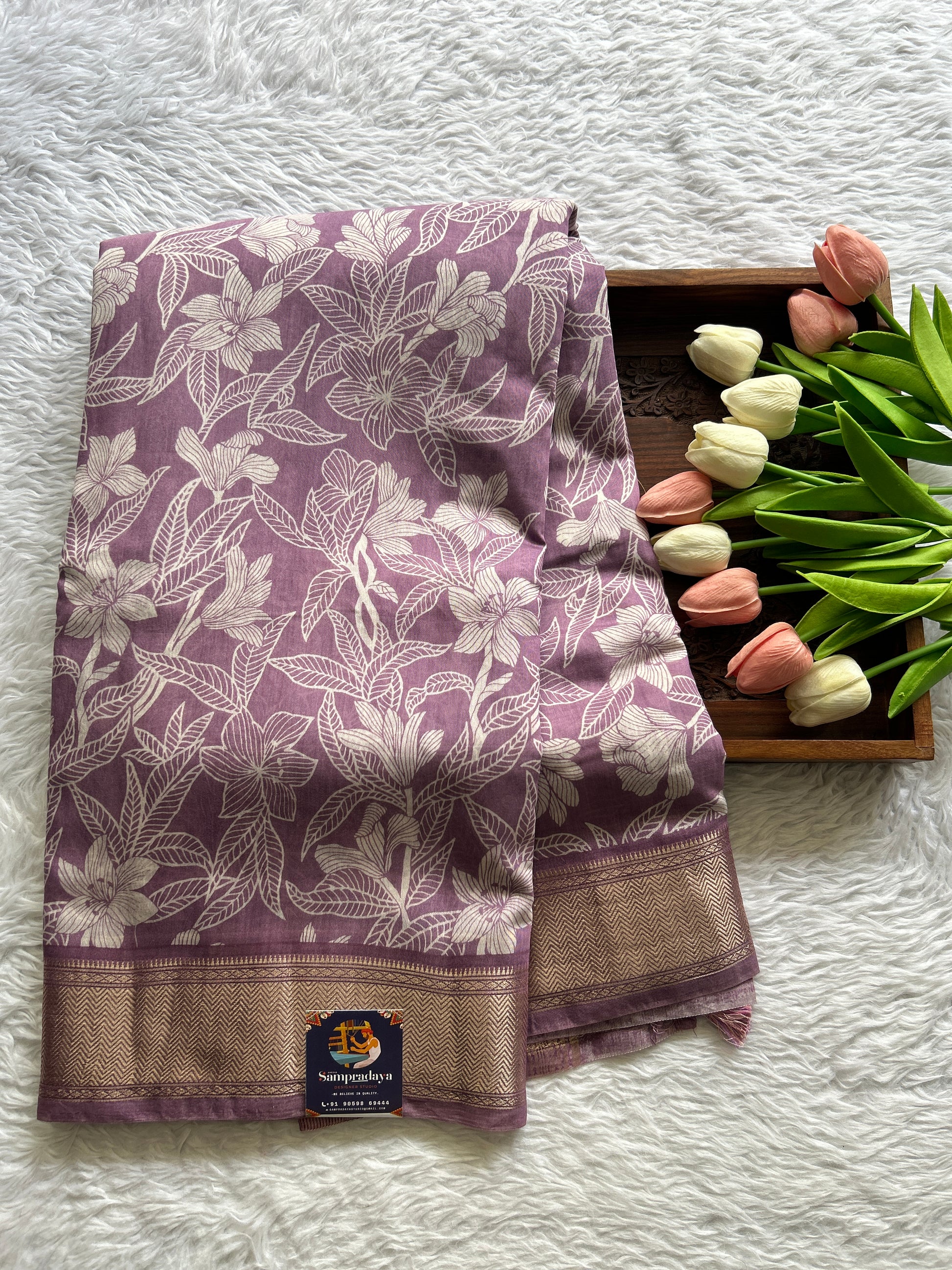 Dola Crepe Saree Lavender Colored Complemented with a Zari Border. - Sampradaya Designer Studio