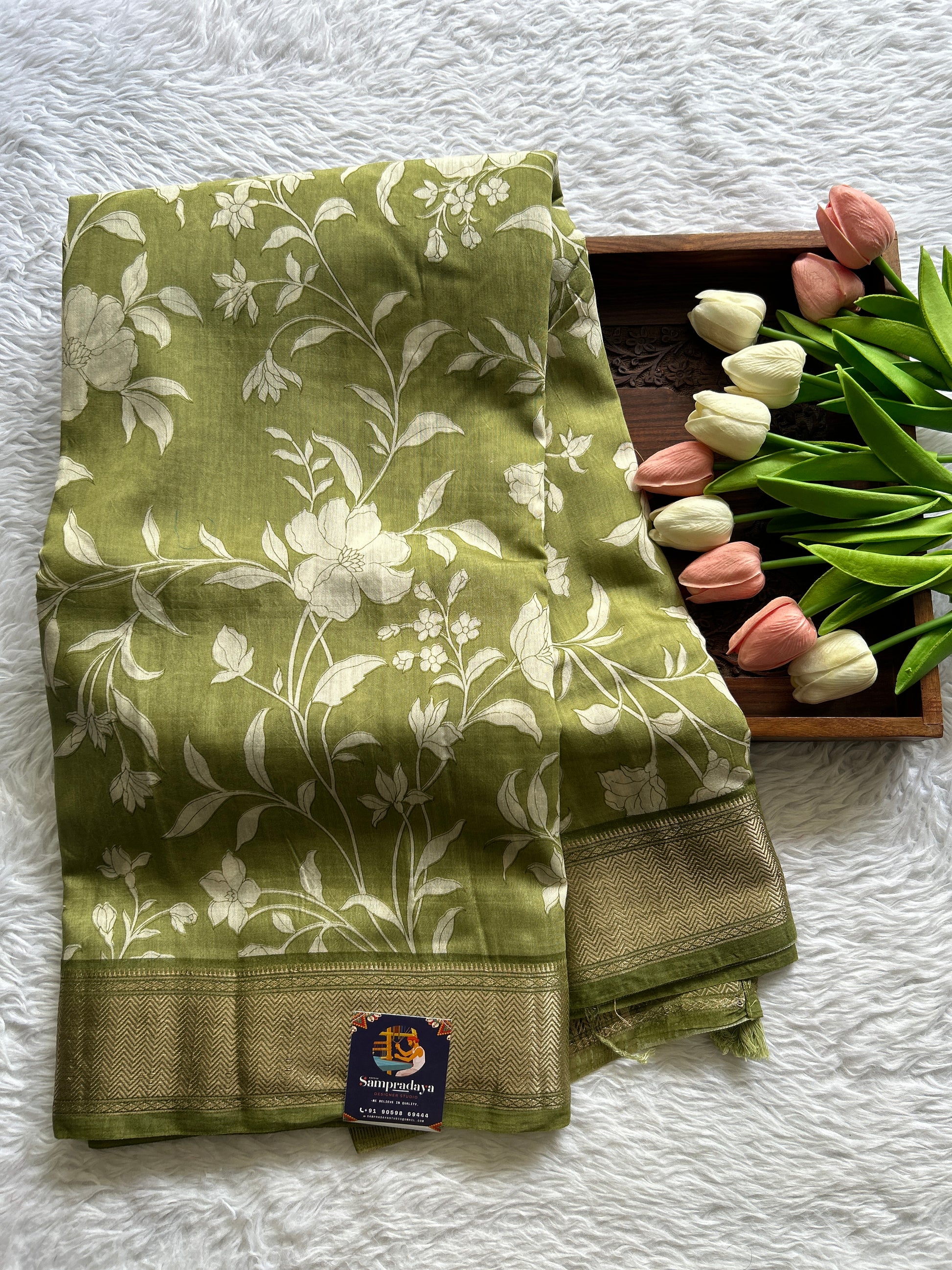 Dola Crepe Saree Olive Green Colored Complemented with a Zari Border. - Sampradaya Designer Studio