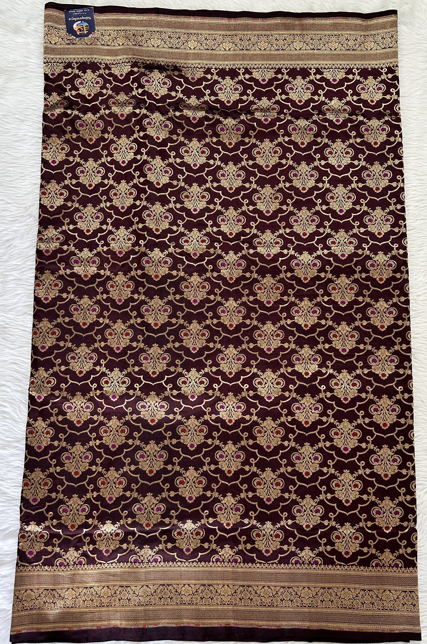 Banarasi Katan Silk Saree Brown colored Saree complemented with a Gold Zari border. - Sampradaya Designer Studio