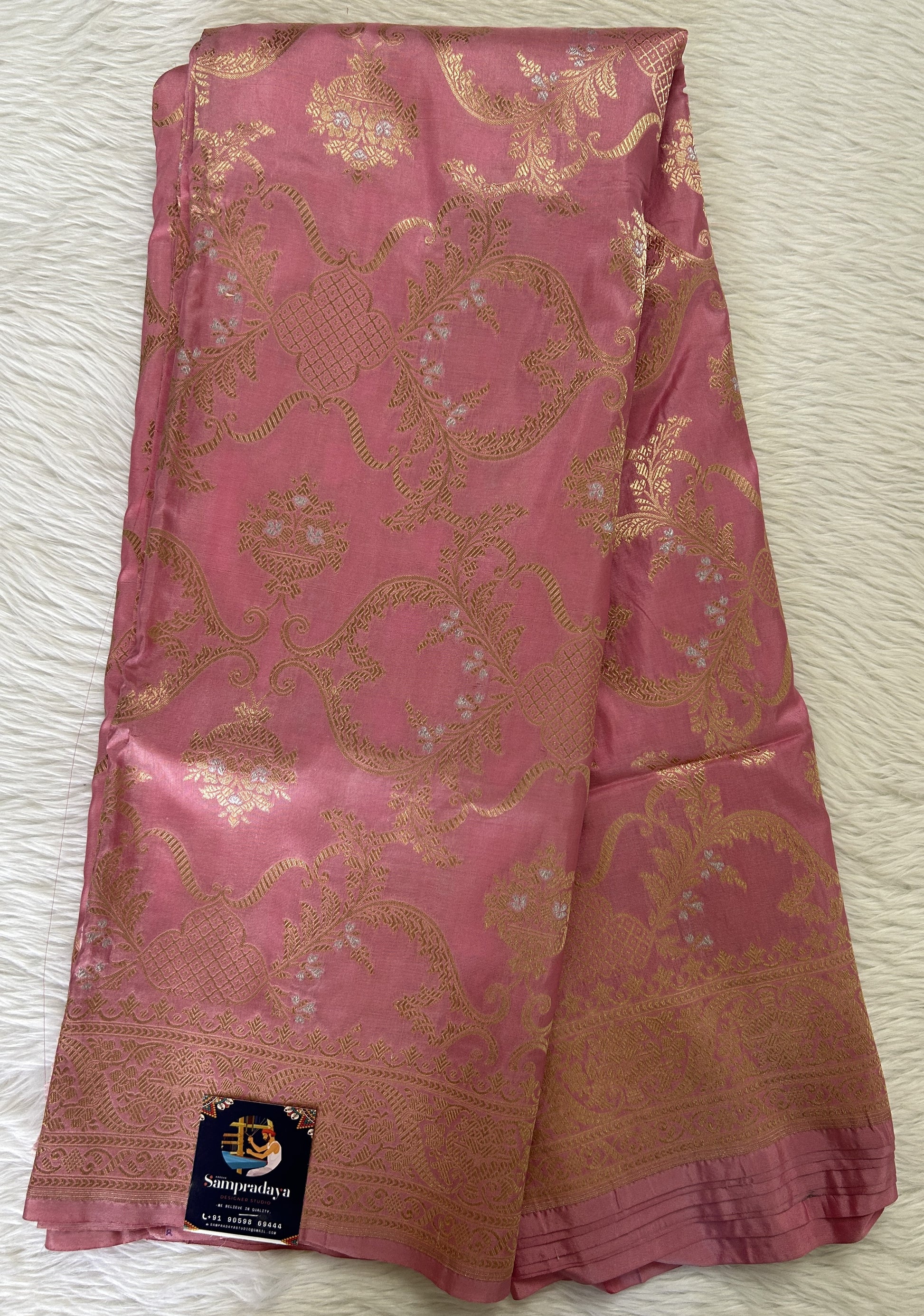 Banarasi Katan Silk Saree Pastel Pink colored Saree complemented with a Light Gold Zari border. - Sampradaya Designer Studio