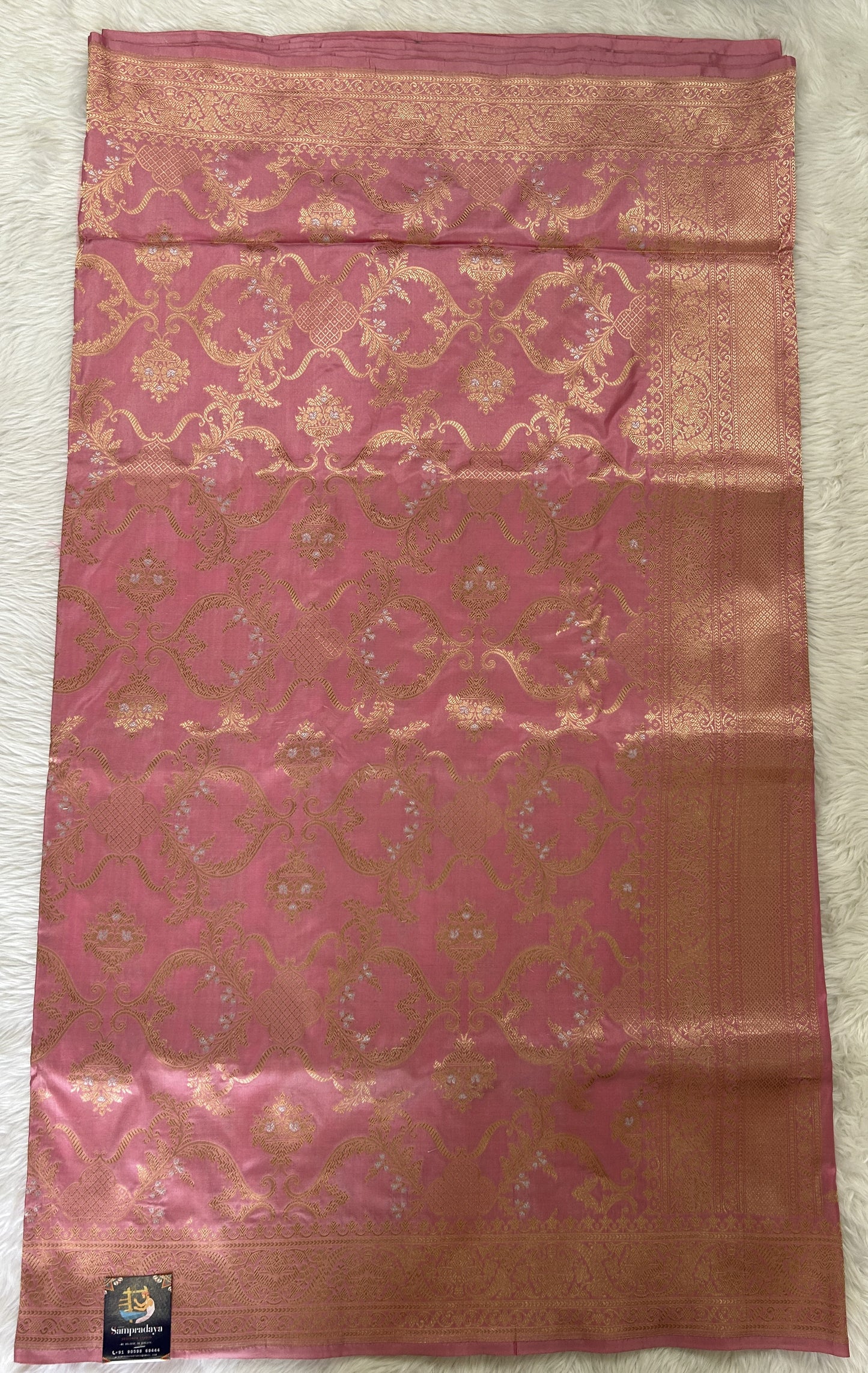 Banarasi Katan Silk Saree Pastel Pink colored Saree complemented with a Light Gold Zari border. - Sampradaya Designer Studio