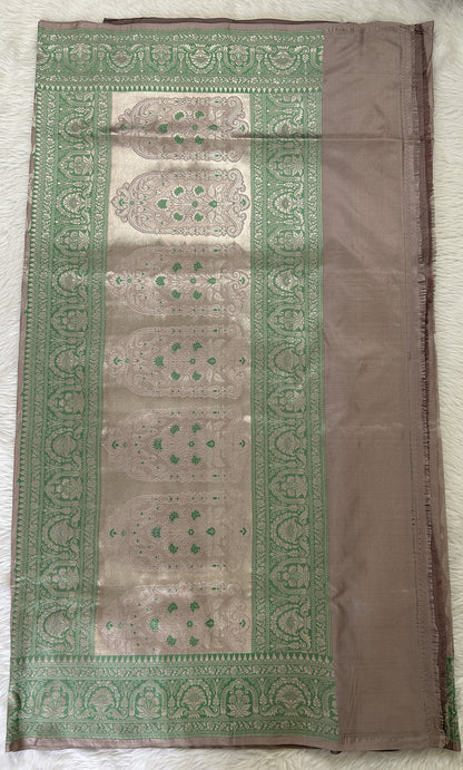 Banarasi Katan Silk Saree Baby Pink colored Saree complemented with a Green Colored Silver Zari border. - Sampradaya Designer Studio