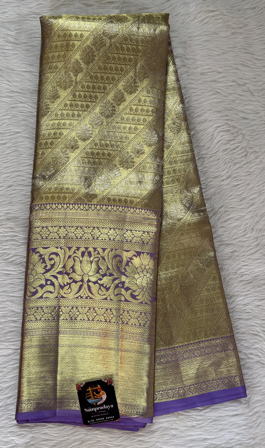 Kanjivaram Bridal Silk Saree Gold colored Saree complemented with a Lavender Colored Kanchi border. - Sampradaya Designer Studio