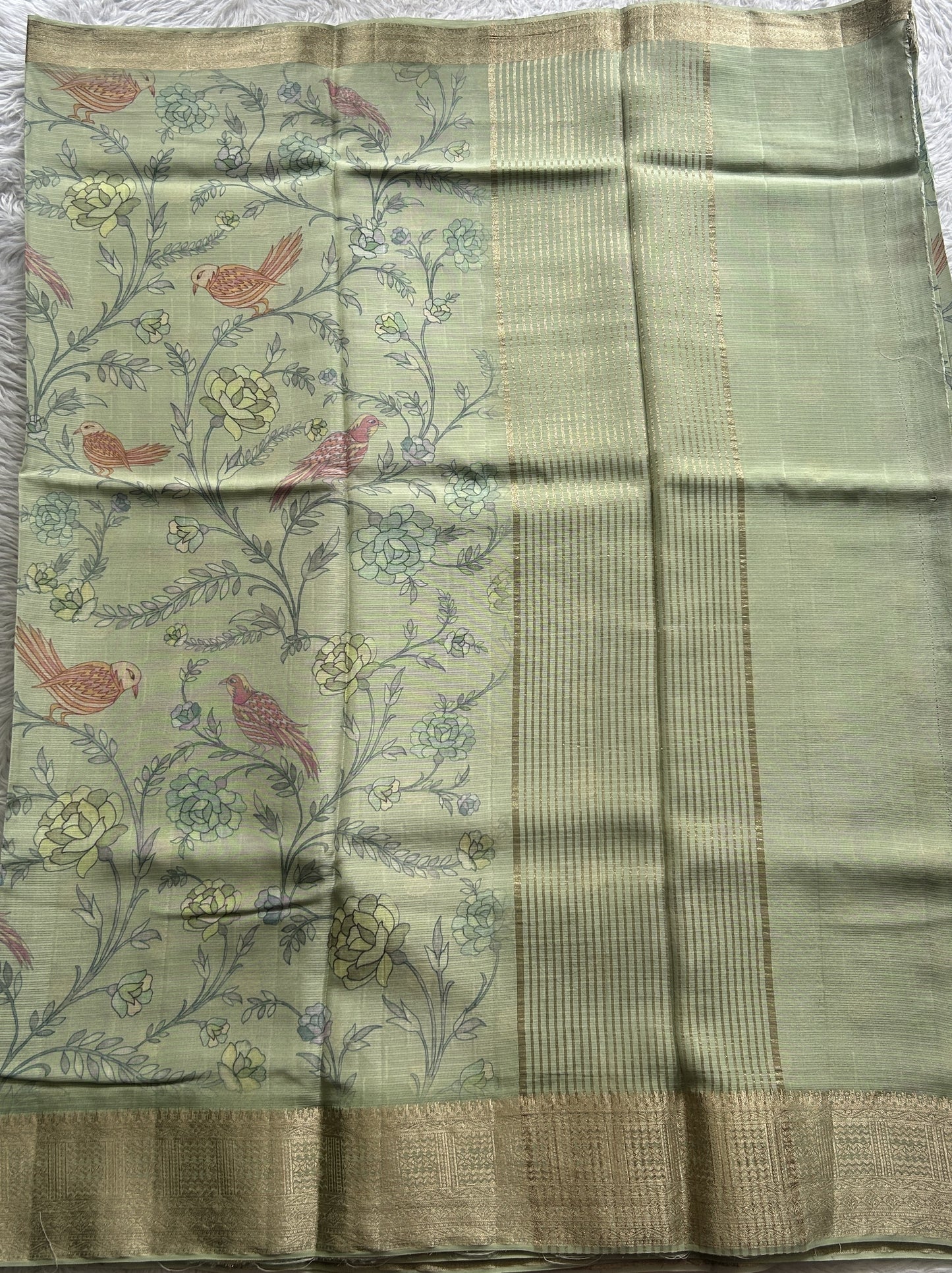 Semi Georgette Saree Light Green Colored Complemented with a Zari Border. - Sampradaya Designer Studio