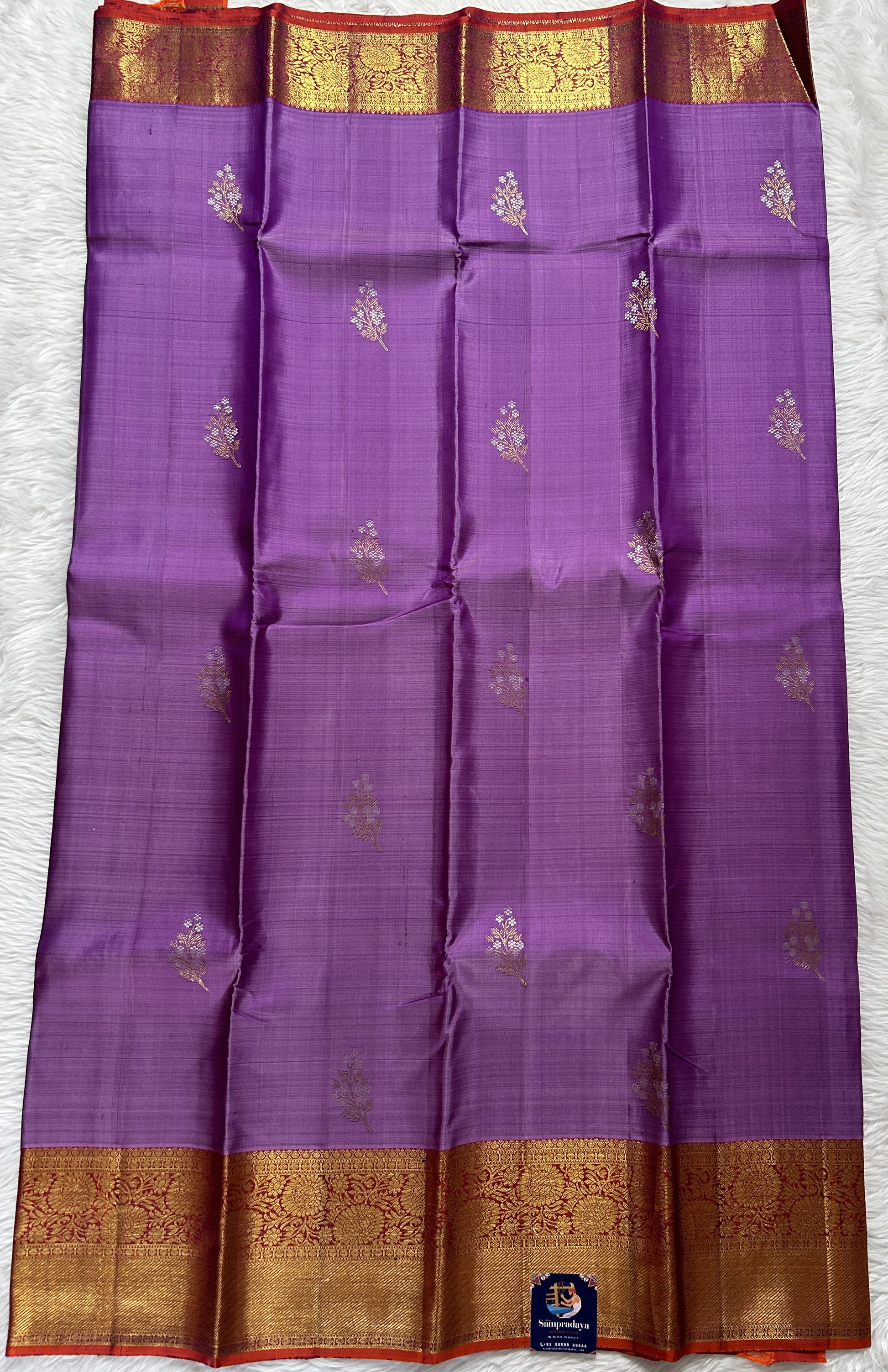 Kanjivaram Festive Silk Saree Lavender colored Saree complemented with a Red Orange Colored Gold Kanchi border. - Sampradaya Designer Studio