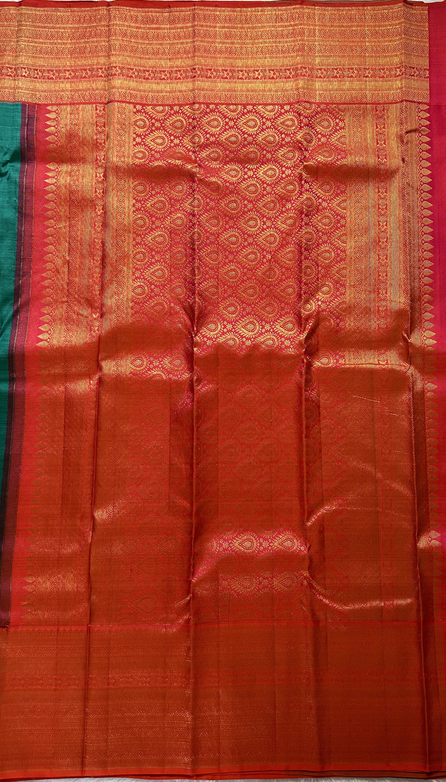 Kanjivaram Festive Silk Saree Persian Green colored Saree complemented with a Red Colored Gold Kanchi border. - Sampradaya Designer Studio