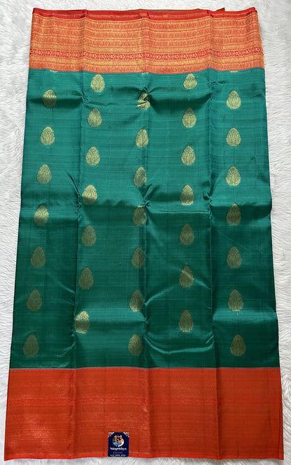 Kanjivaram Festive Silk Saree Persian Green colored Saree complemented with a Red Colored Gold Kanchi border. - Sampradaya Designer Studio