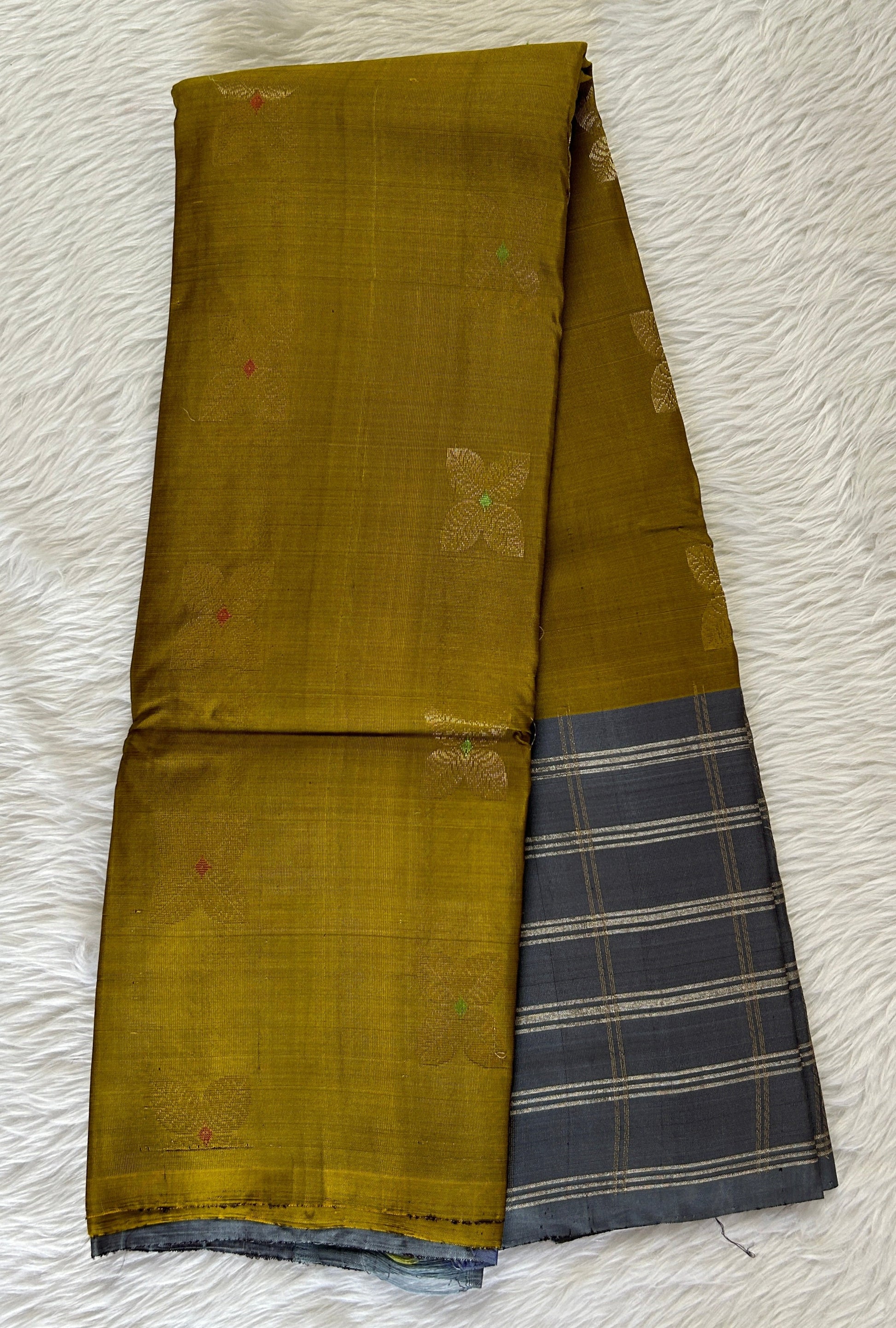 Kanjivaram Festive Silk Saree Mustard Green colored Saree complemented with a Gray Checks border. - Sampradaya Designer Studio