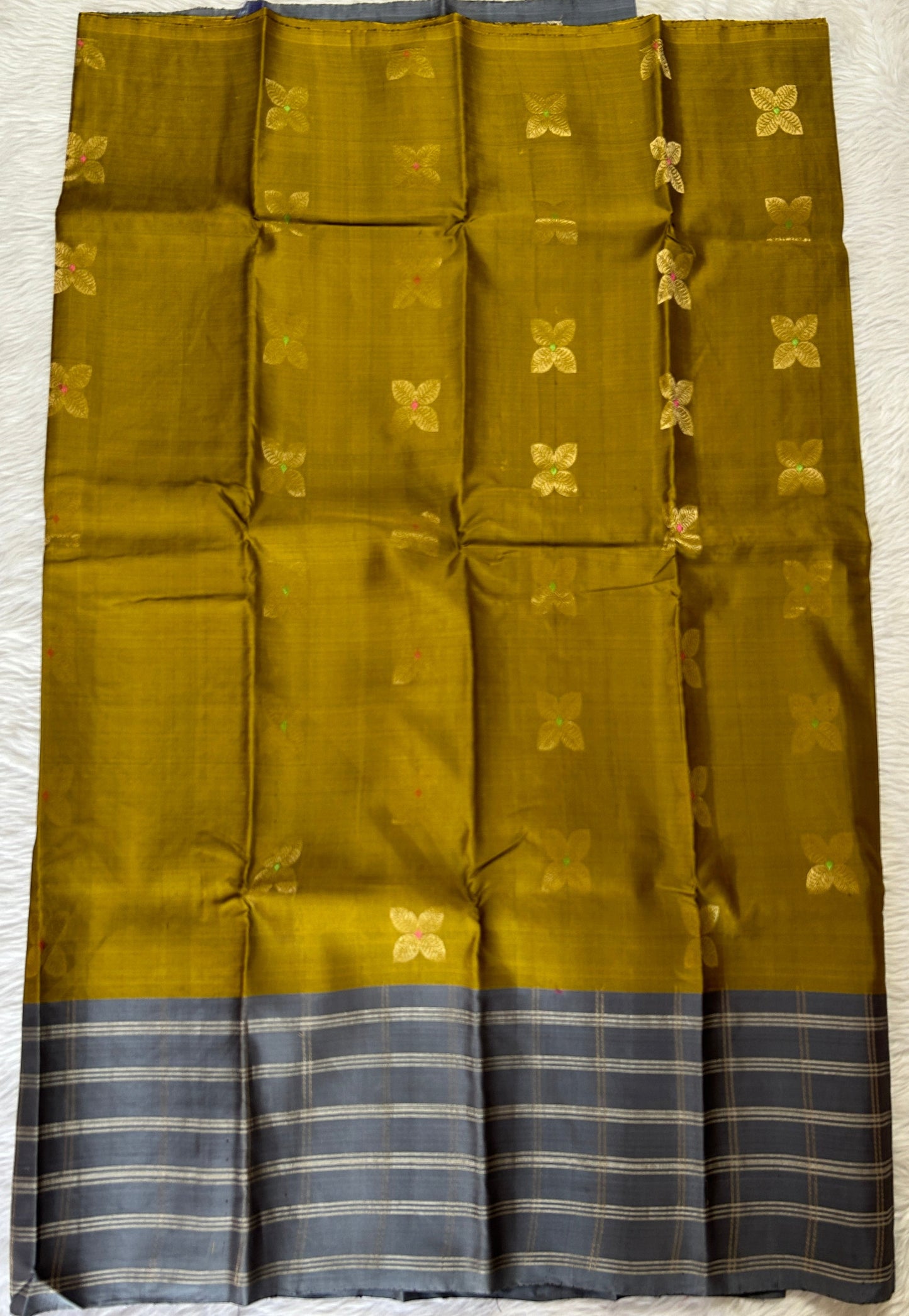 Kanjivaram Festive Silk Saree Mustard Green colored Saree complemented with a Gray Checks border. - Sampradaya Designer Studio