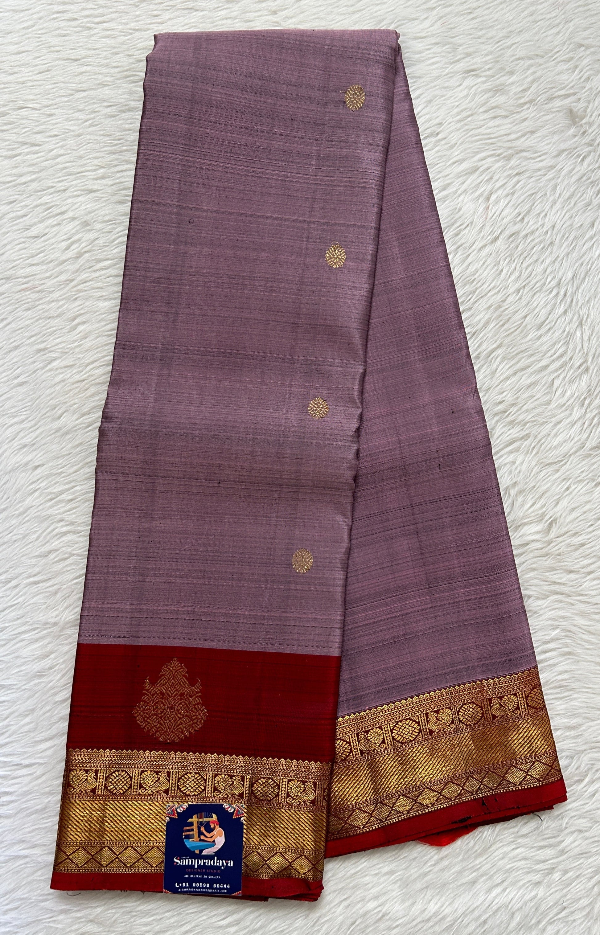 Kanjivaram Festive Silk Saree Dark Lavender colored Saree complemented with a Maroon Colored Kanchi border. - Sampradaya Designer Studio