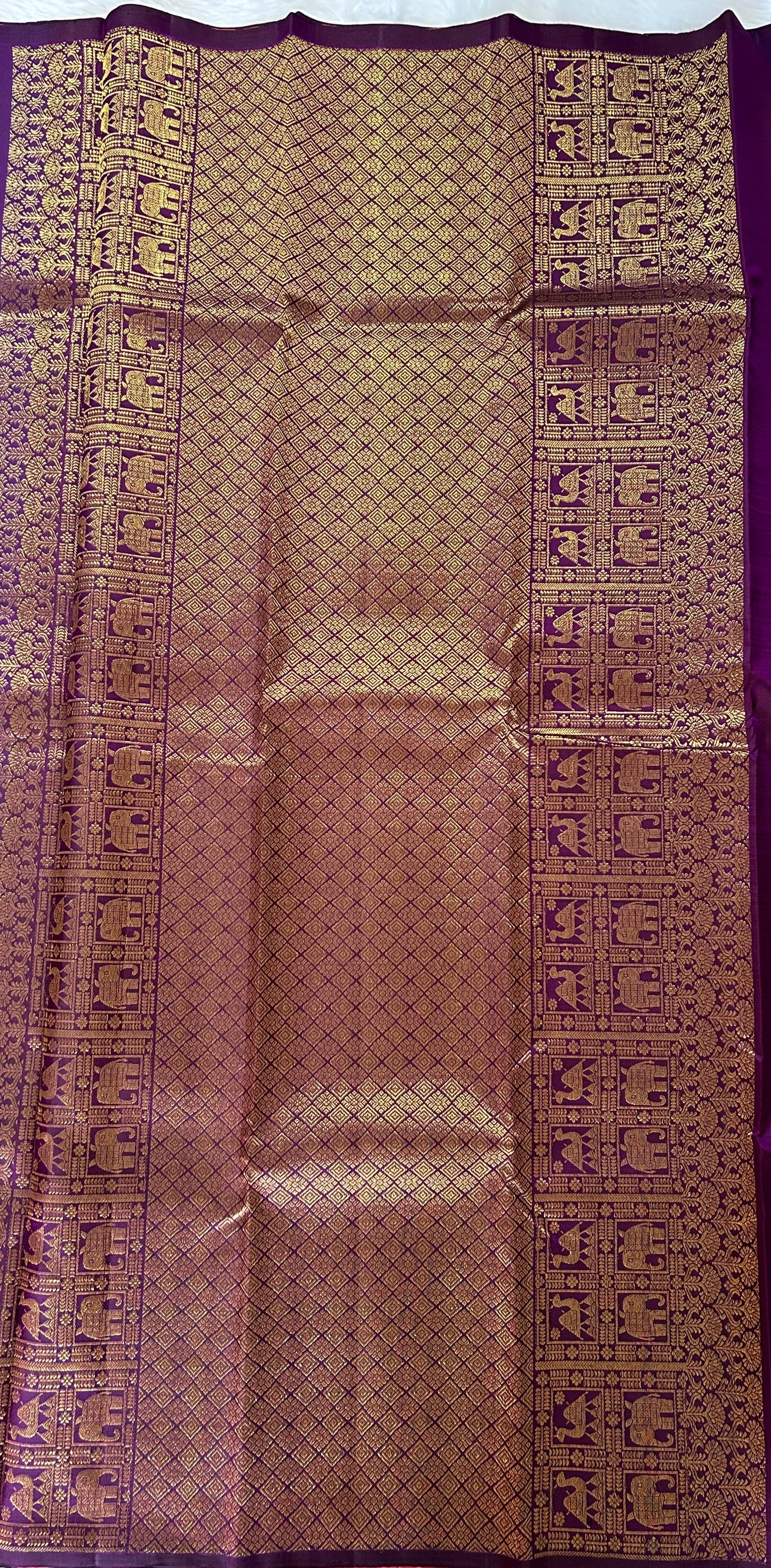 Kanjivaram Festive Silk Saree Dark Purple colored Saree complemented with a Buti border. - Sampradaya Designer Studio