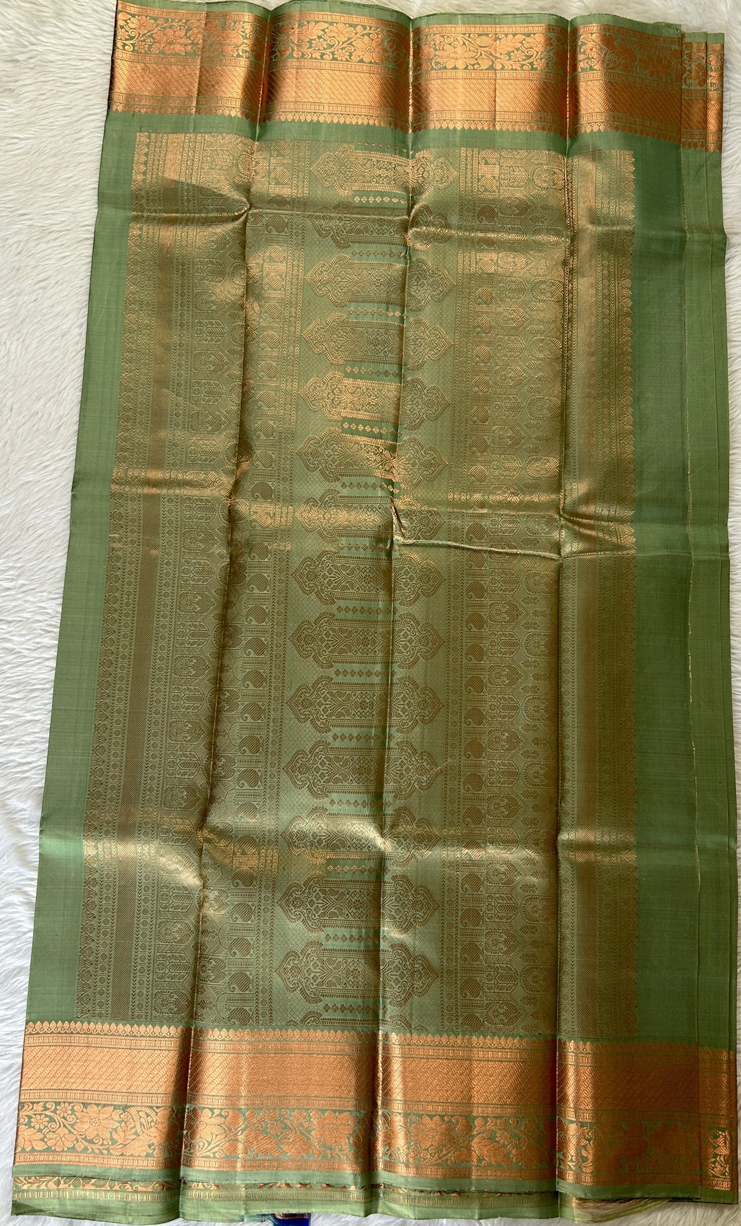 Kanjivaram Festive Silk Saree Pastel Green colored Saree complemented with a Kanchi border. - Sampradaya Designer Studio