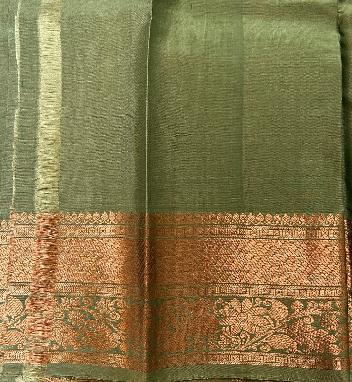 Kanjivaram Festive Silk Saree Pastel Green colored Saree complemented with a Kanchi border. - Sampradaya Designer Studio