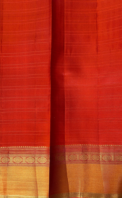 Kanjivaram Festive Silk Saree Lavender colored Saree complemented with a Orange Colored Kanchi border. - Sampradaya Designer Studio