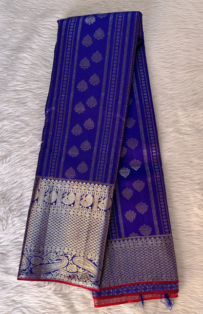 Kanjivaram Festive Silk Saree Cobalt Blue colored Saree complemented with a Silver Kanchi border. - Sampradaya Designer Studio