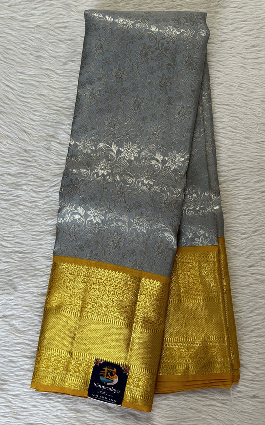 Kanjivaram Bridal Silk Saree Gray colored Saree complemented with a Yellow Colored Gold Kanchi border. - Sampradaya Designer Studio