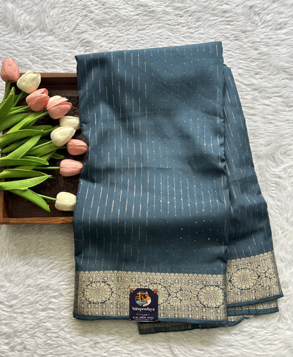 Semi Georgette Saree Grayish Blue Colored Complemented with a Zari Border. - Sampradaya Designer Studio