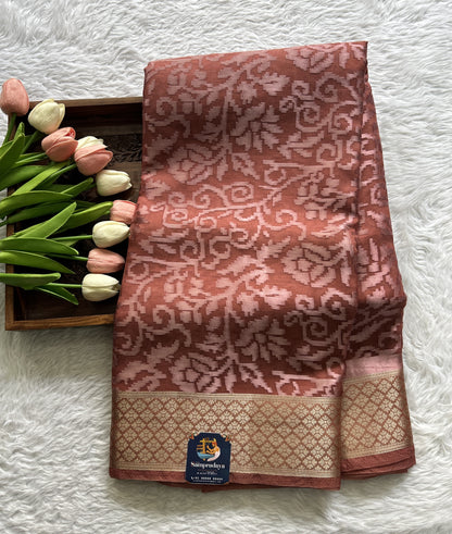 Semi Georgette Saree Peach Colored Complemented with a Zari Border. - Sampradaya Designer Studio