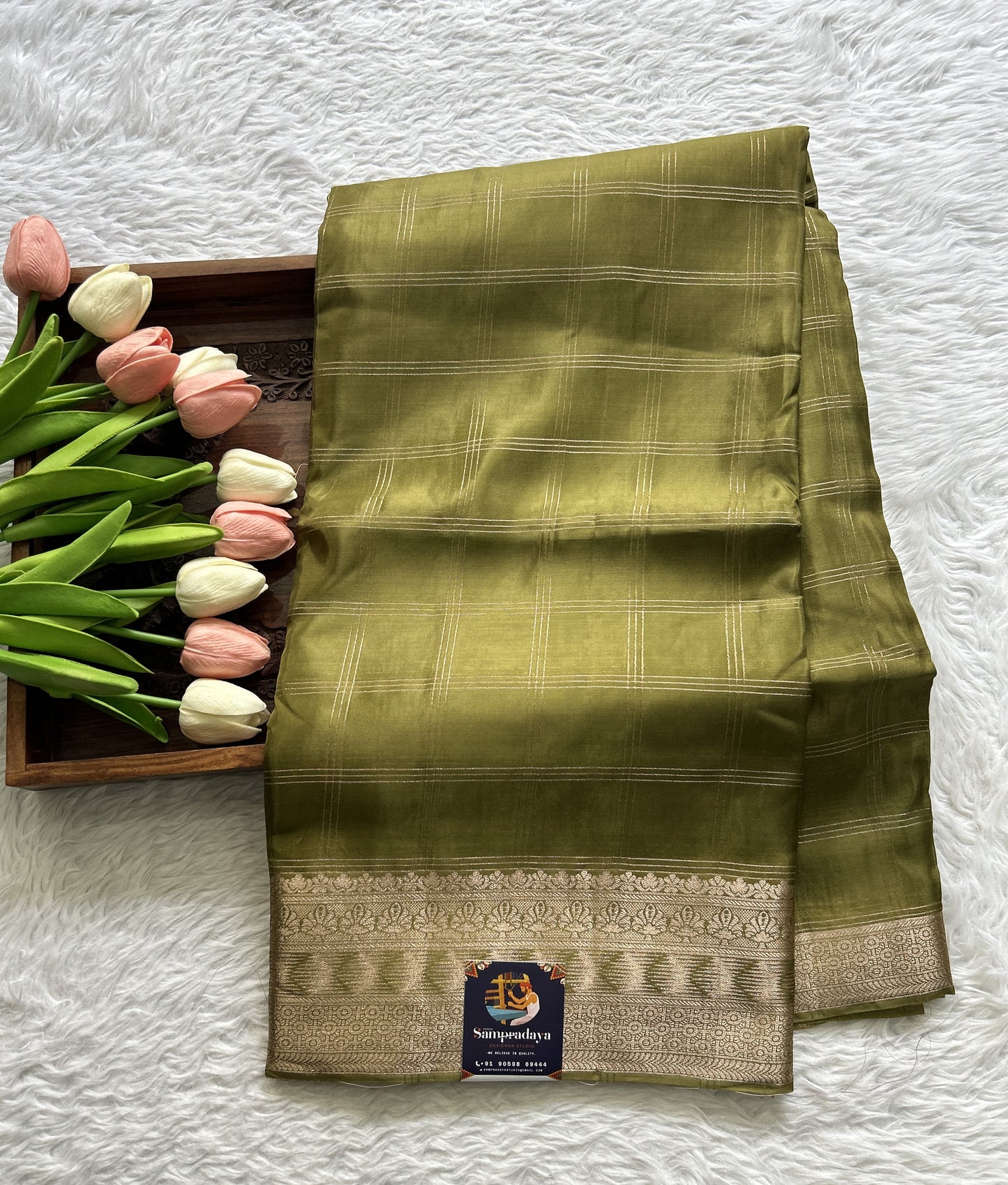 Satin Silk Saree Olive Green Colored Complemented with a Zari Border. - Sampradaya Designer Studio