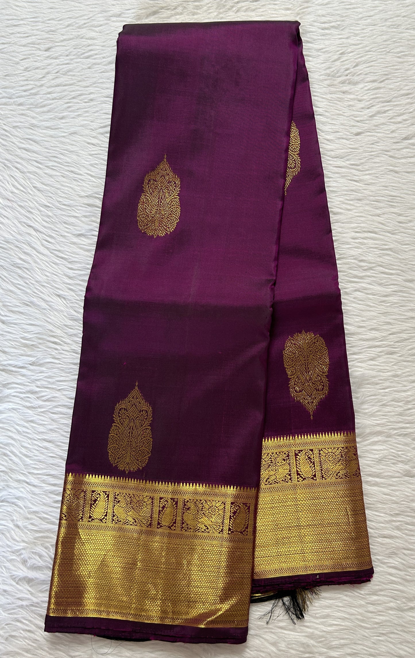 Kanjivaram Festive Silk Saree Dark Purple colored Saree complemented with a Kanchi border. - Sampradaya Designer Studio