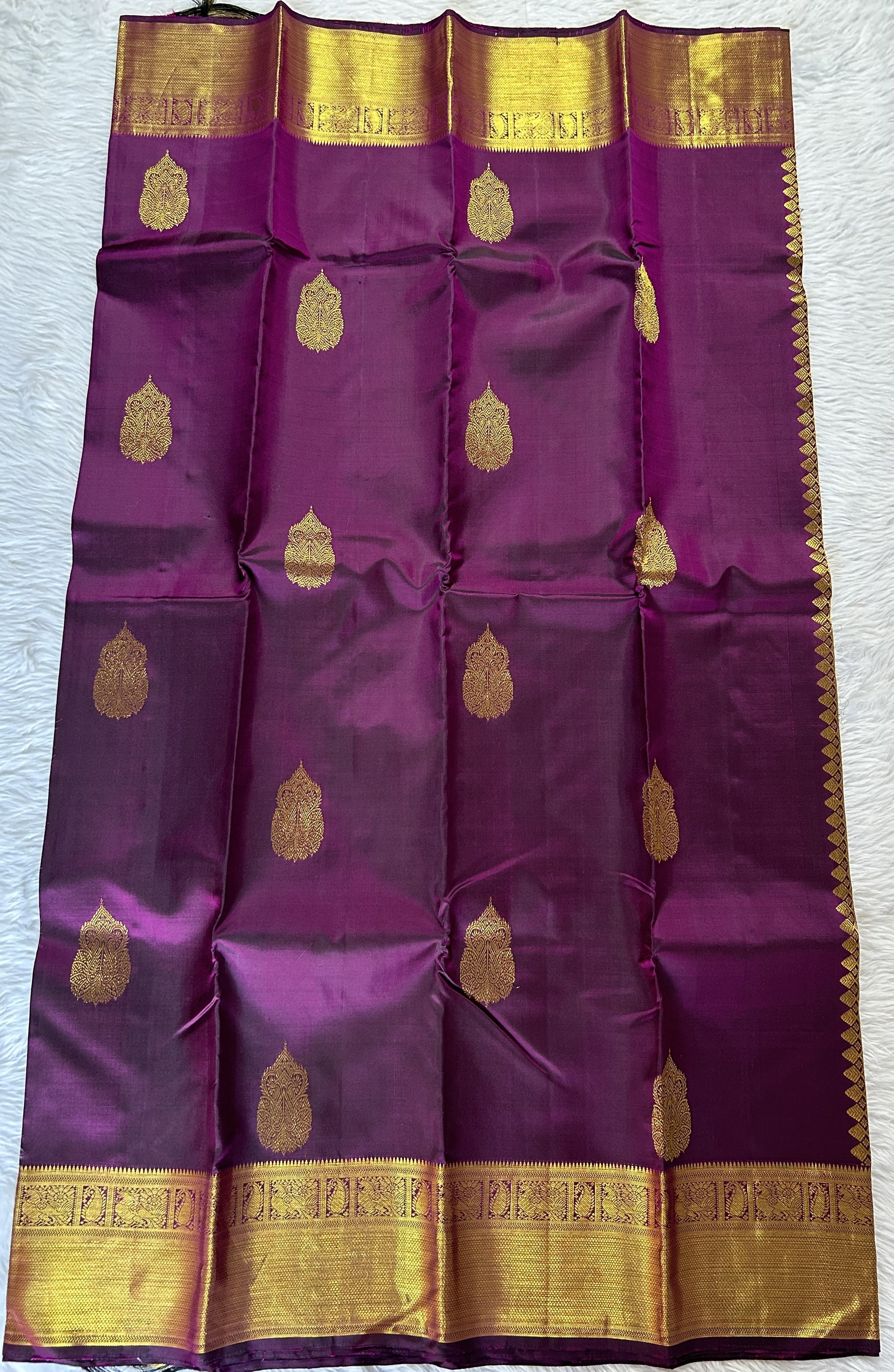 Kanjivaram Festive Silk Saree Dark Purple colored Saree complemented with a Kanchi border. - Sampradaya Designer Studio