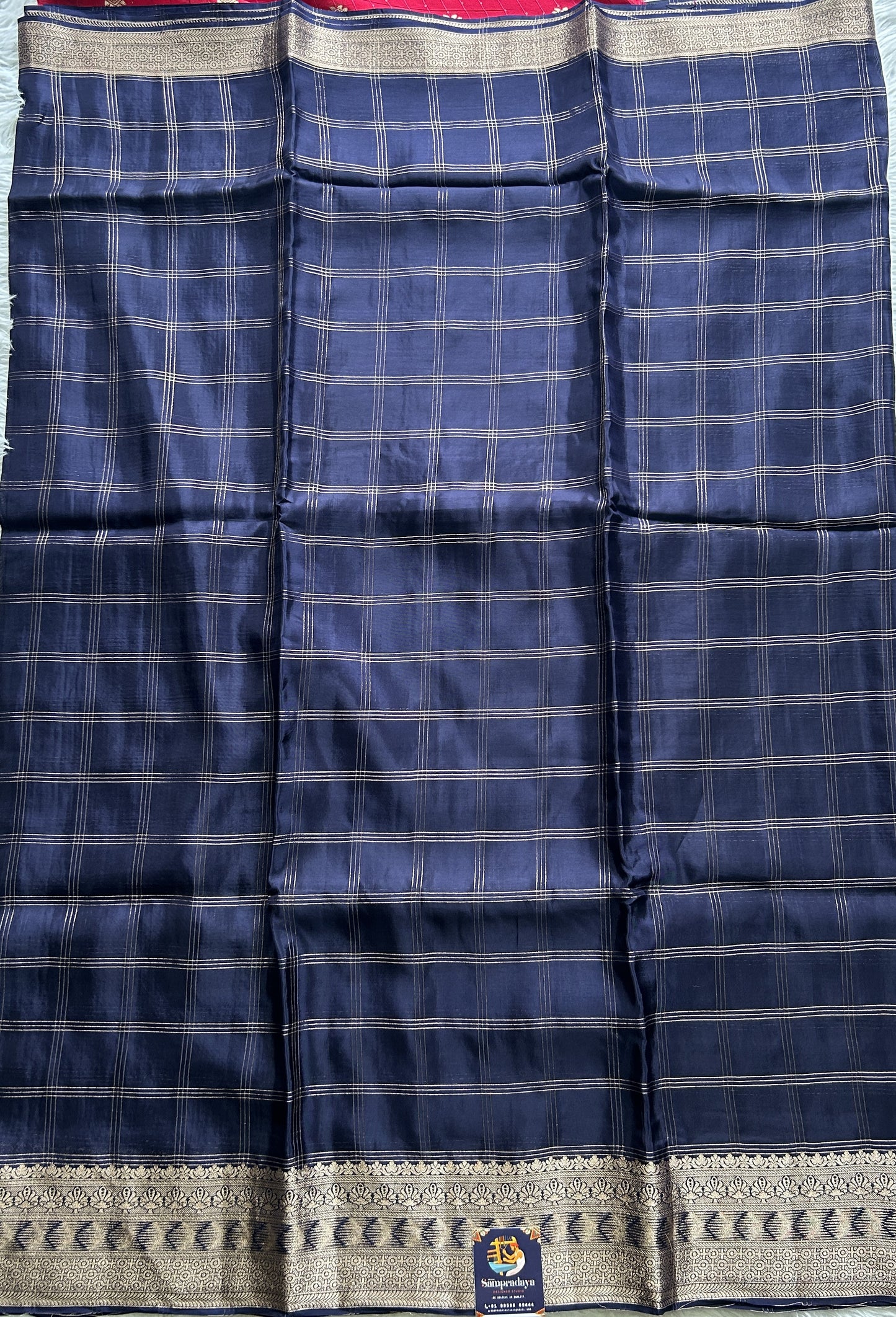 Satin Silk Saree Navy Blue Colored Complemented with a Zari Border. - Sampradaya Designer Studio