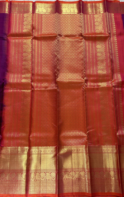 Kanjivaram Festive Silk Saree Dark Purple colored Saree complemented with a Orange Colored Kanchi border. - Sampradaya Designer Studio