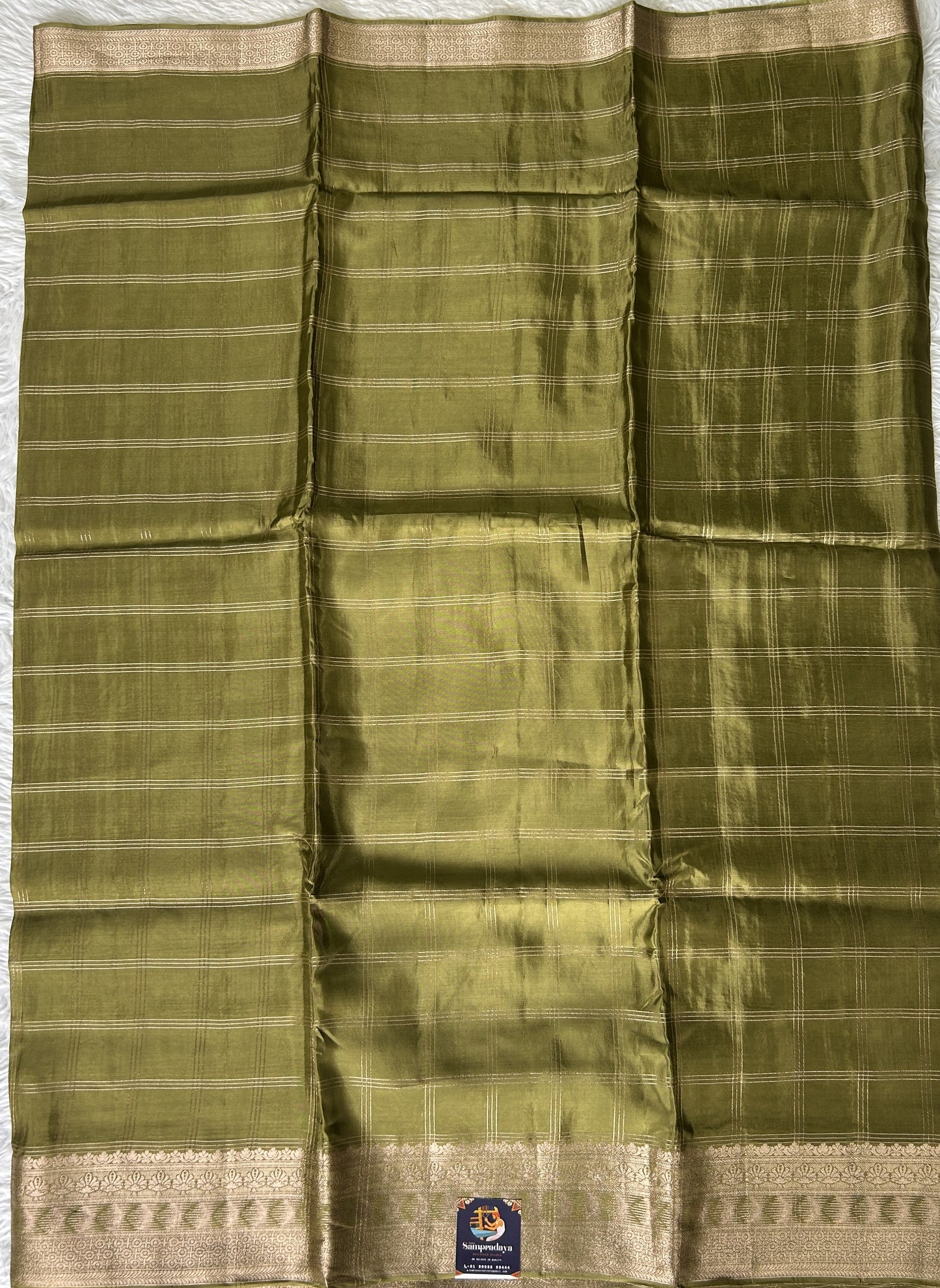 Satin Silk Saree Olive Green Colored Complemented with a Zari Border. - Sampradaya Designer Studio