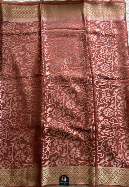 Semi Georgette Saree Peach Colored Complemented with a Zari Border. - Sampradaya Designer Studio