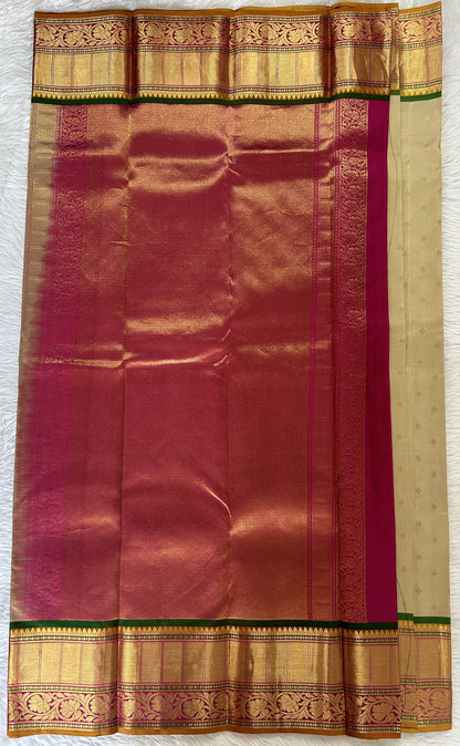 Kanjivaram Festive Silk Saree Biscuit colored Saree complemented with a Pink Colored Gold Kanchi border. - Sampradaya Designer Studio