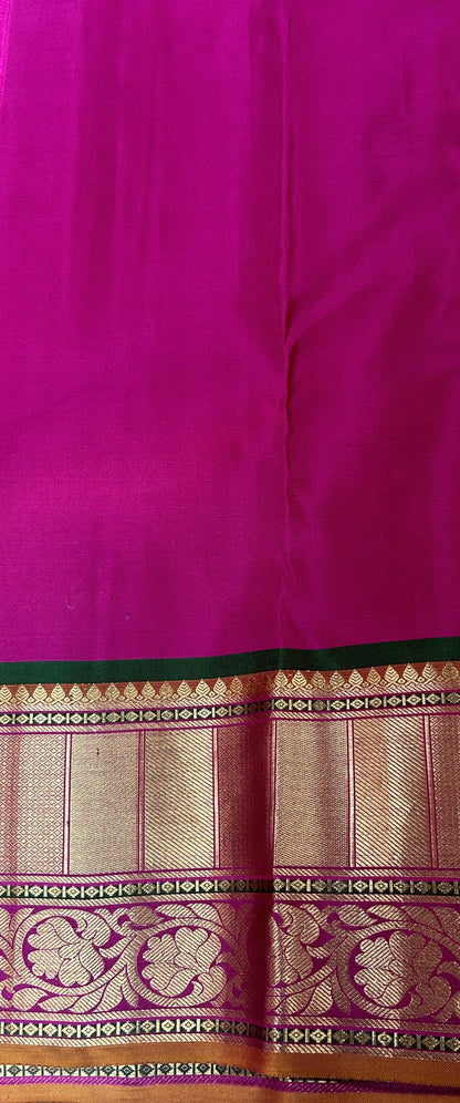 Kanjivaram Festive Silk Saree Biscuit colored Saree complemented with a Pink Colored Gold Kanchi border. - Sampradaya Designer Studio