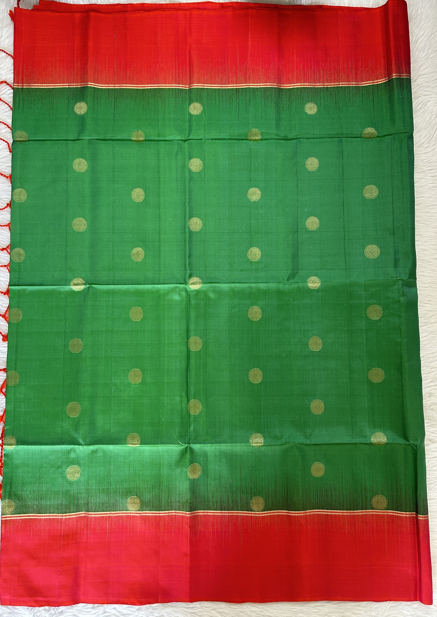 Kanjivaram Festive Silk Saree Green colored Saree complemented with a Pinkish Orange Colored Plain border. - Sampradaya Designer Studio