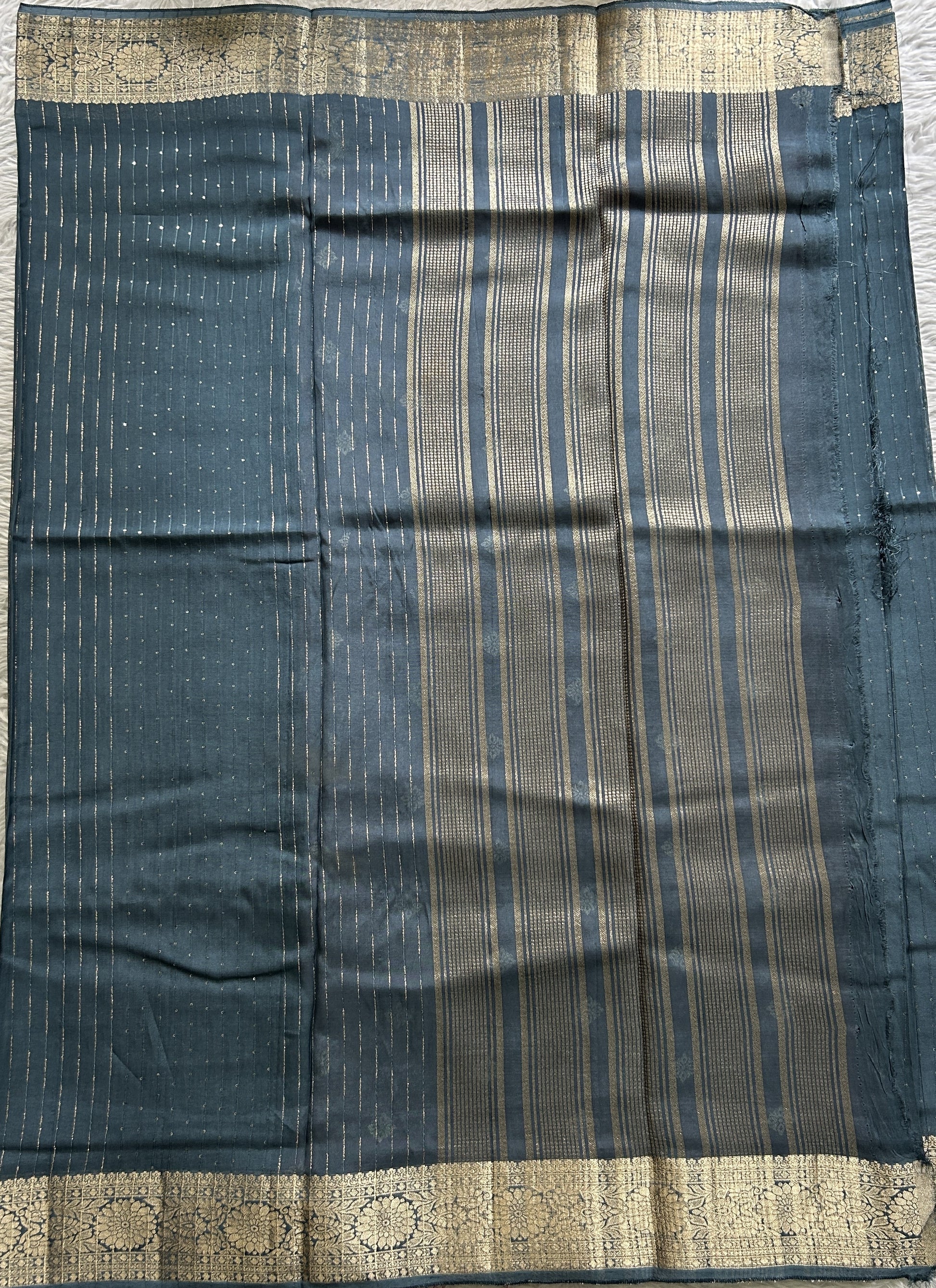 Semi Georgette Saree Grayish Blue Colored Complemented with a Zari Border. - Sampradaya Designer Studio