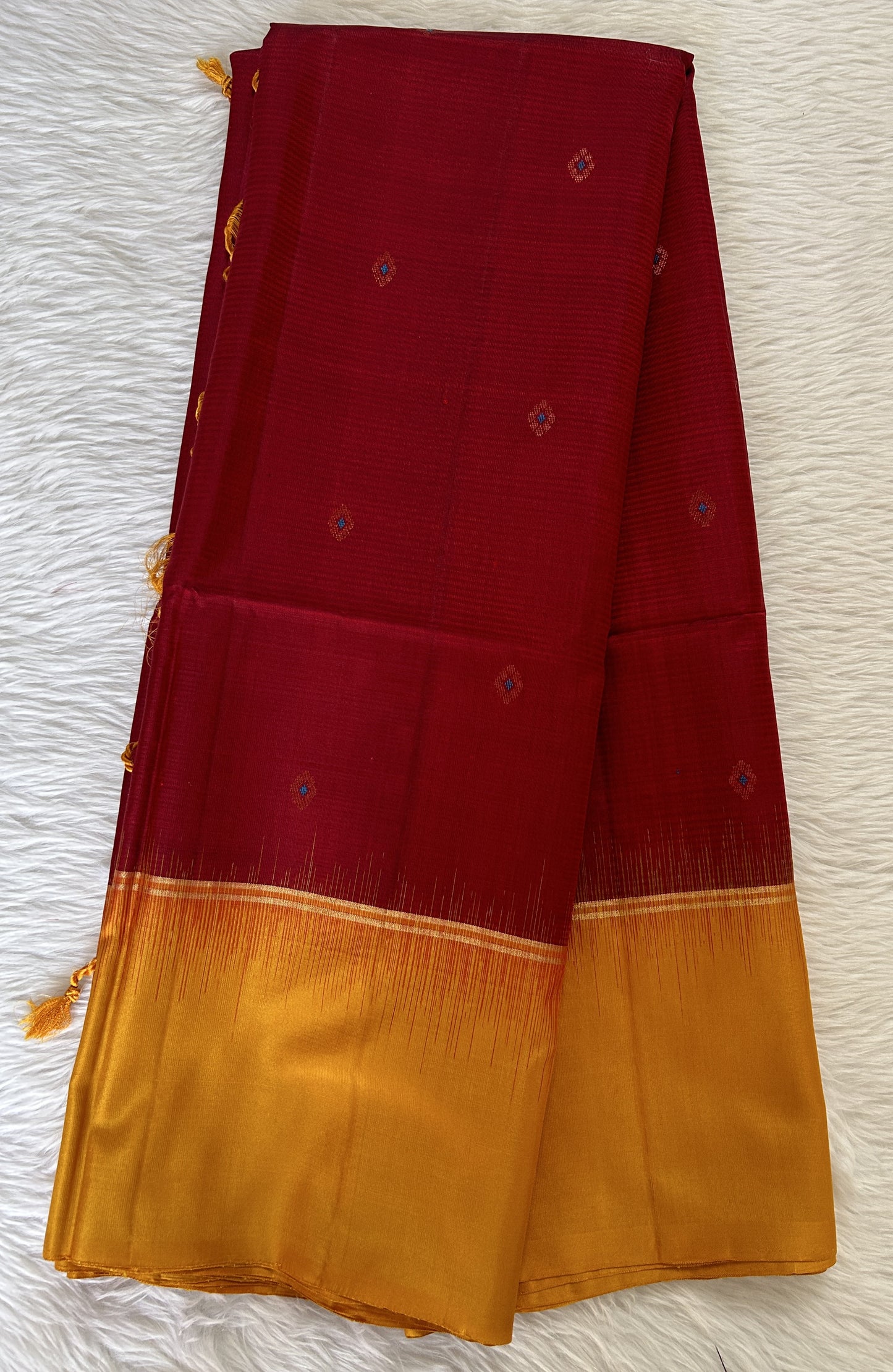 Kanjivaram Festive Silk Saree Maroon colored Saree complemented with a Yellow Colored Plain border. - Sampradaya Designer Studio