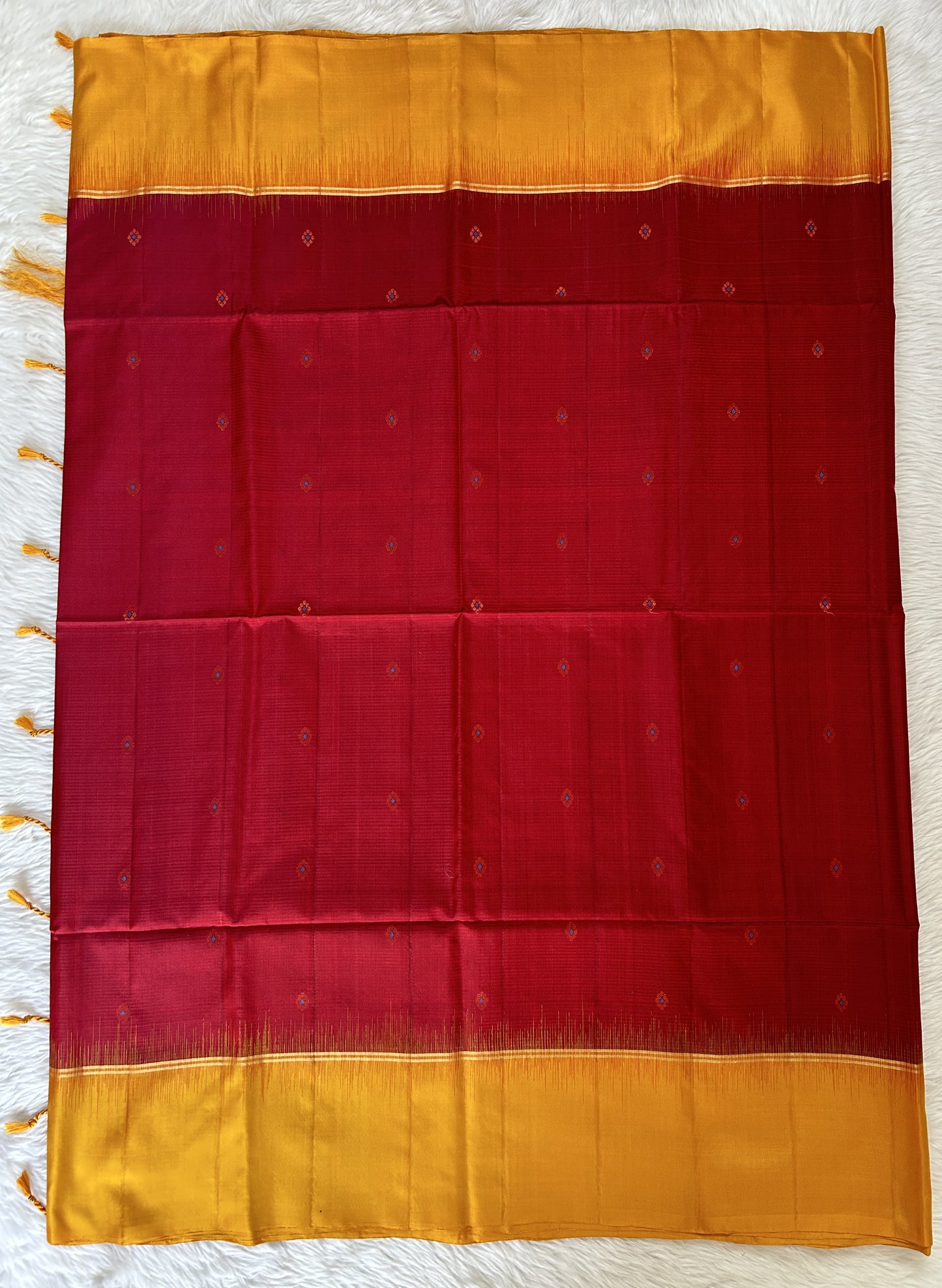 Kanjivaram Festive Silk Saree Maroon colored Saree complemented with a Yellow Colored Plain border. - Sampradaya Designer Studio