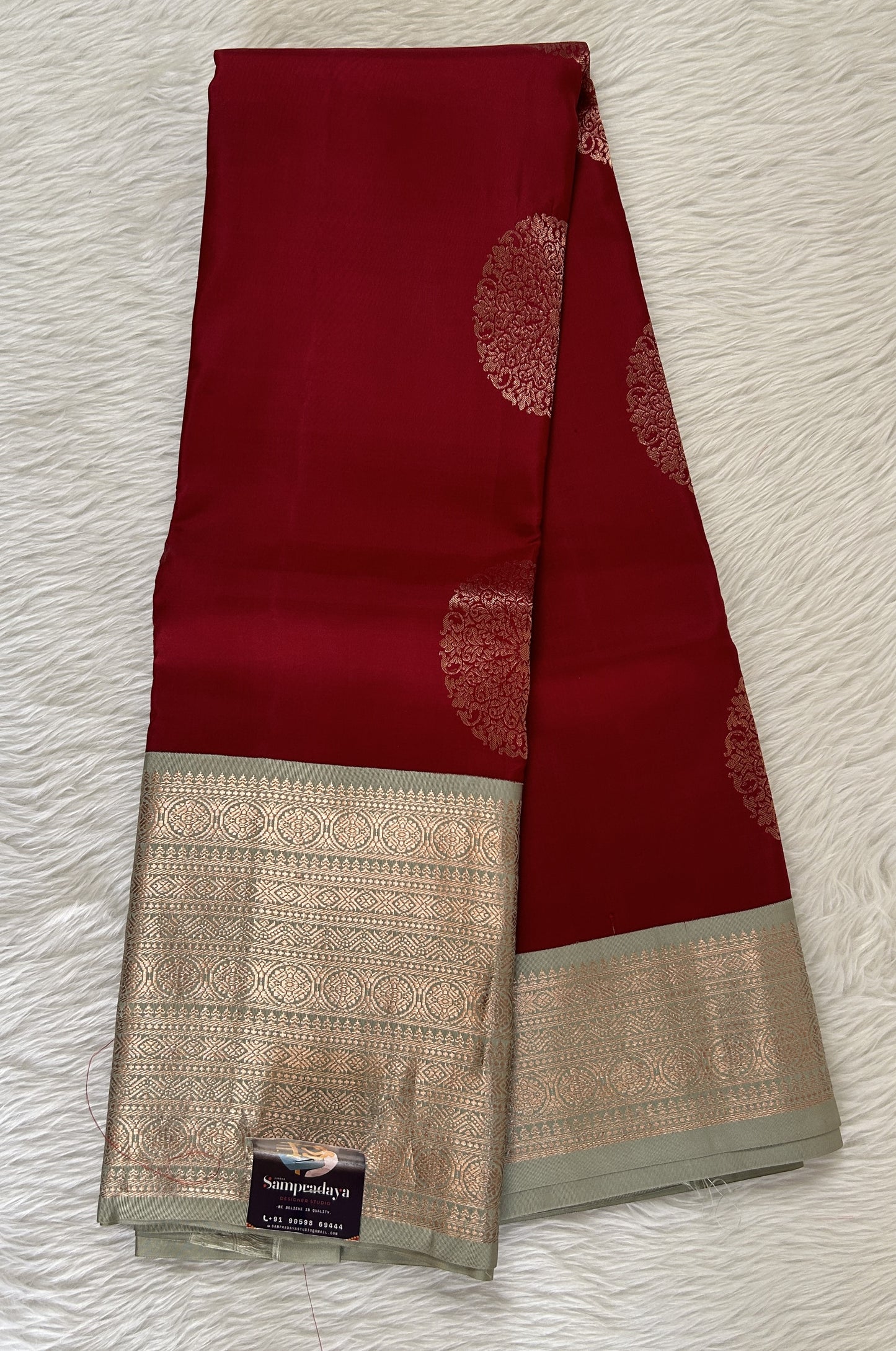 Kanjivaram Festive Silk Saree Maroon colored Saree complemented with a Pastel Green Colored Kanchi border. - Sampradaya Designer Studio