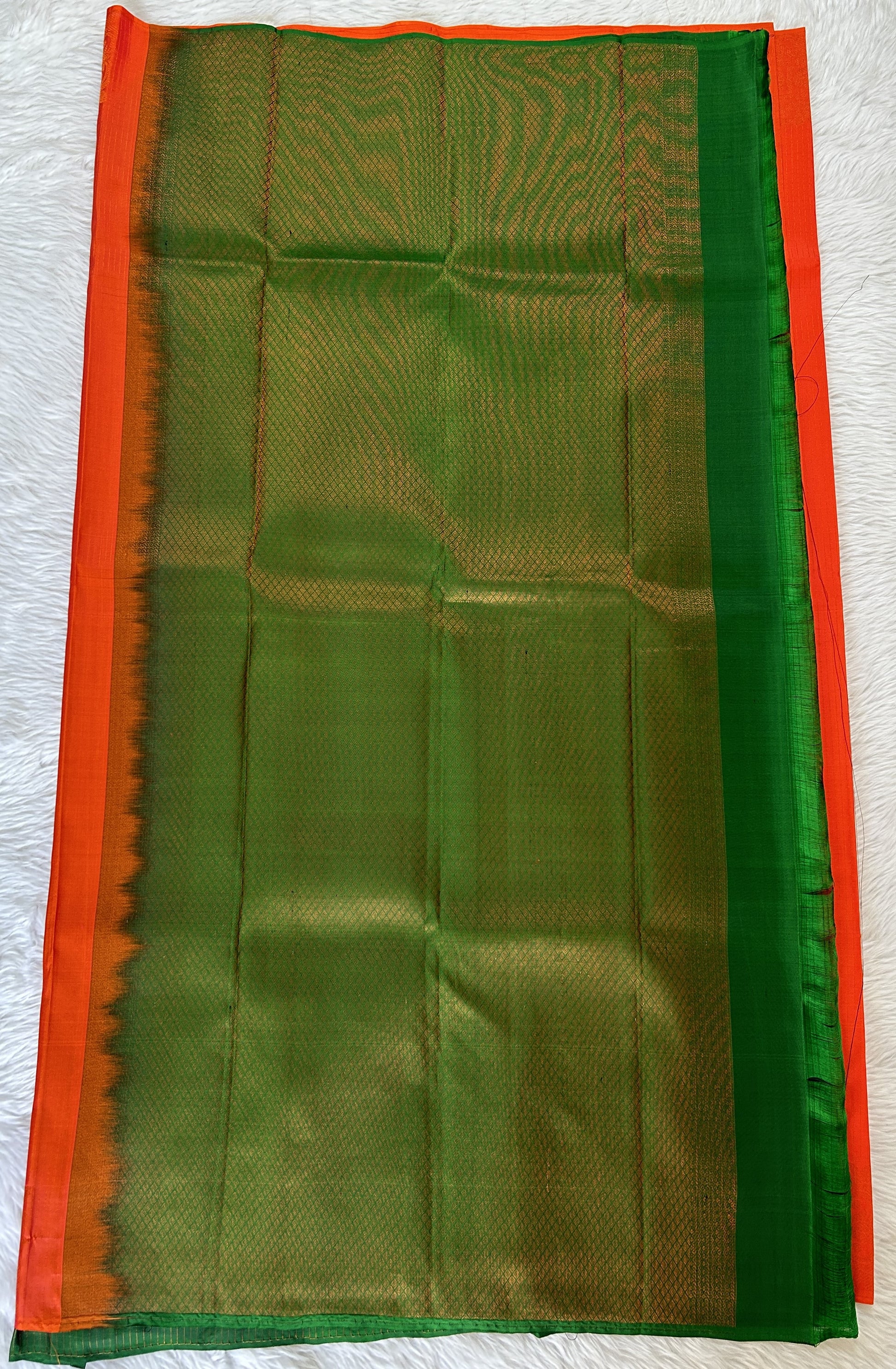 Kanjivaram Festive Silk Saree Orange colored Saree complemented with a Borderless Saree. - Sampradaya Designer Studio