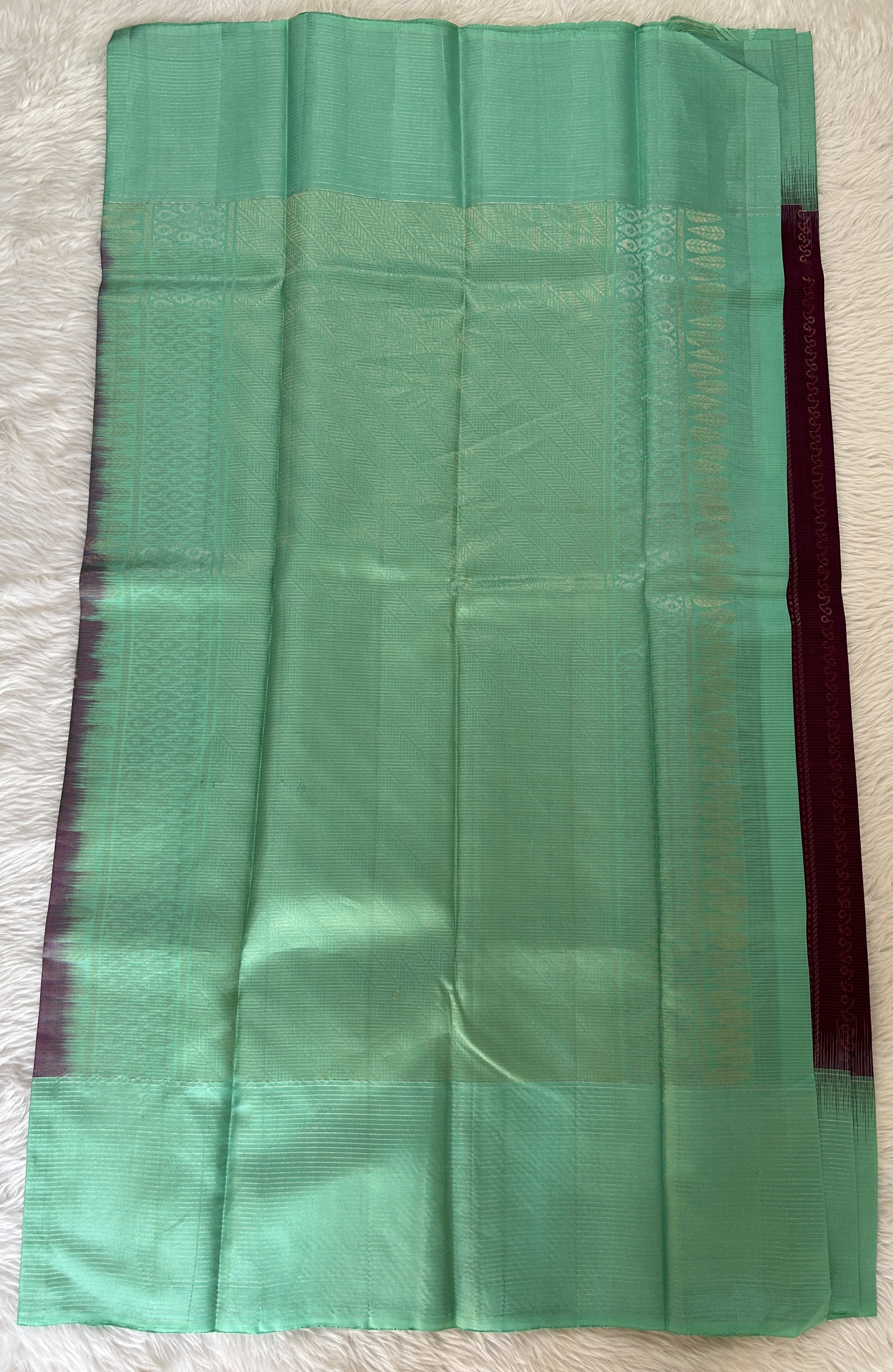 Kanjivaram Festive Silk Saree Purple colored Saree complemented with a Sea Green Color Zari Border. - Sampradaya Designer Studio