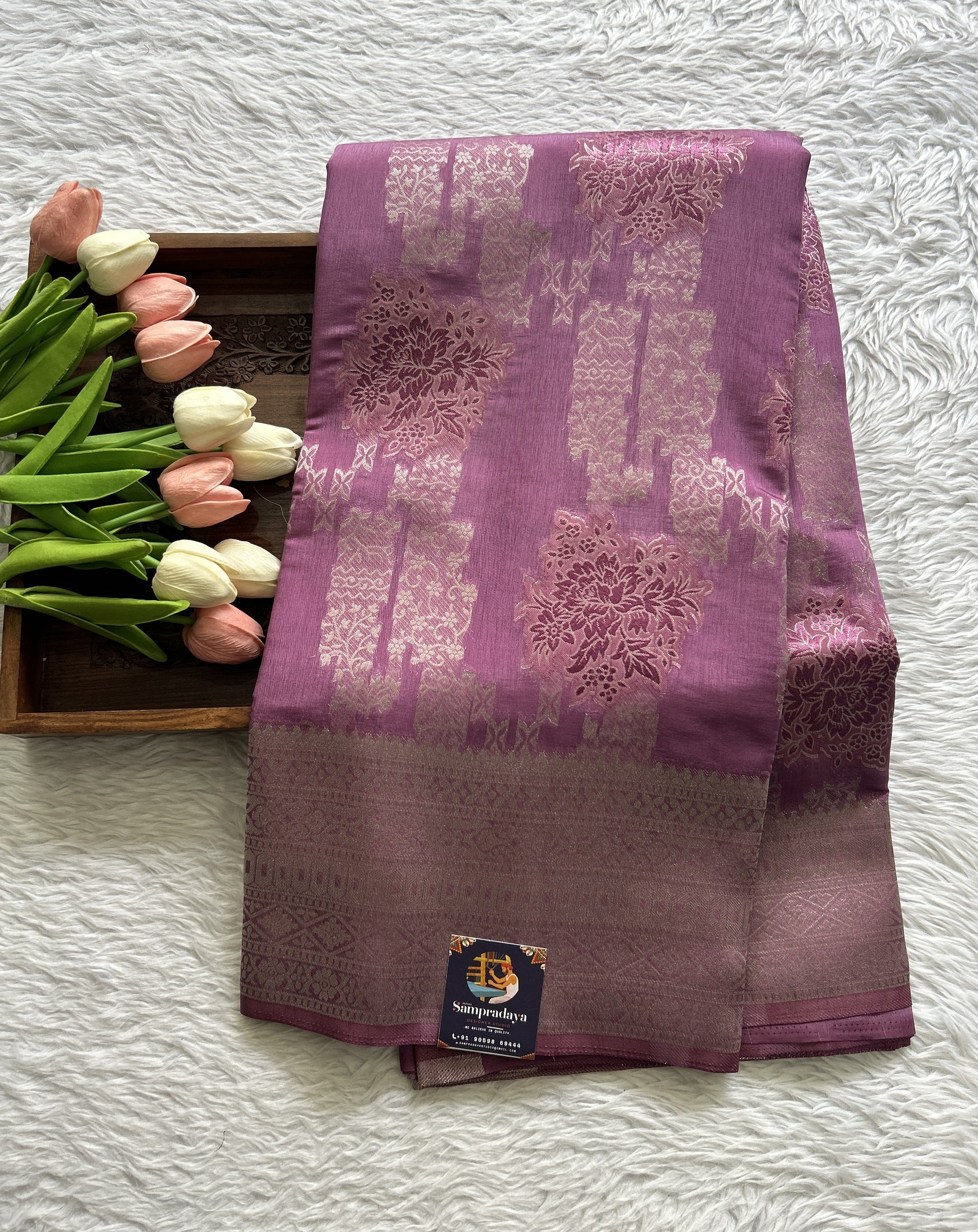 Semi Georgette Saree Lavender Colored Complemented with a Zari Border. - Sampradaya Designer Studio