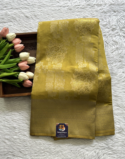 Semi Georgette Saree Light Olive Green Colored Complemented with a Zari Border. - Sampradaya Designer Studio