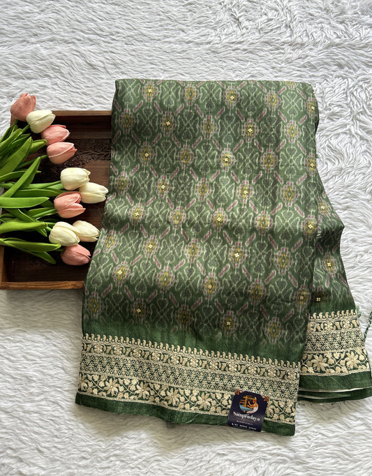 Semi Tussar Saree Bottle Green Colored complemented with a Embroidery Border. - Sampradaya Designer Studio