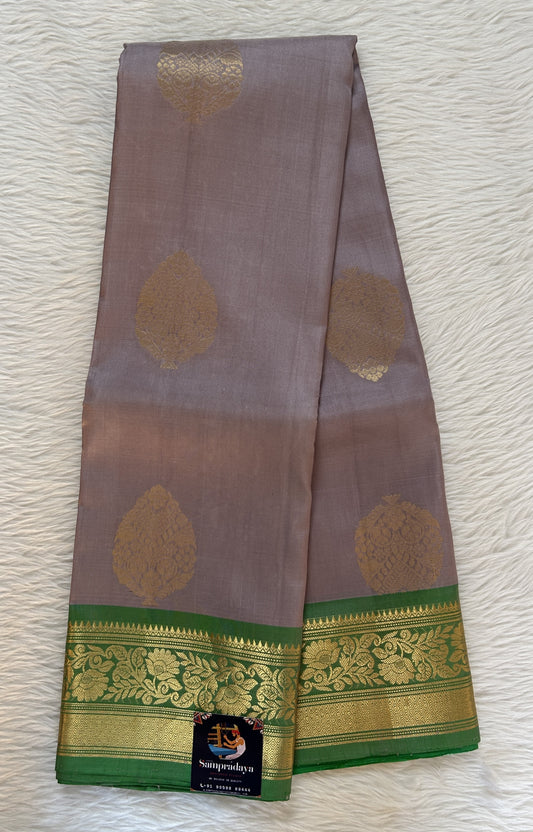 Kanjivaram Festive Silk Saree Gray colored Saree complemented with a Green Color Kanchi Border. - Sampradaya Designer Studio