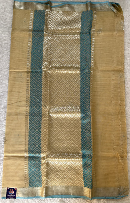 Zarikota saree Cream colored Saree complemented with a Silver Zari border. - Sampradaya Designer Studio